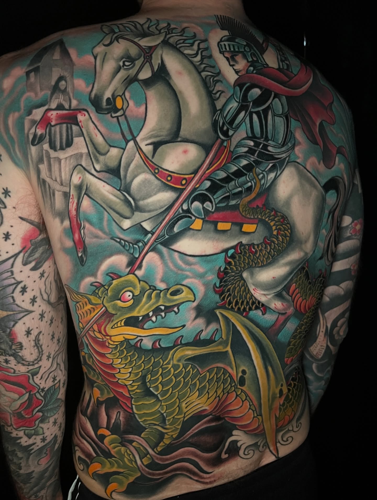 St George slaying the dragon American traditional tattoo on the back by JoshUA Bowers, Des Moines, Iowa