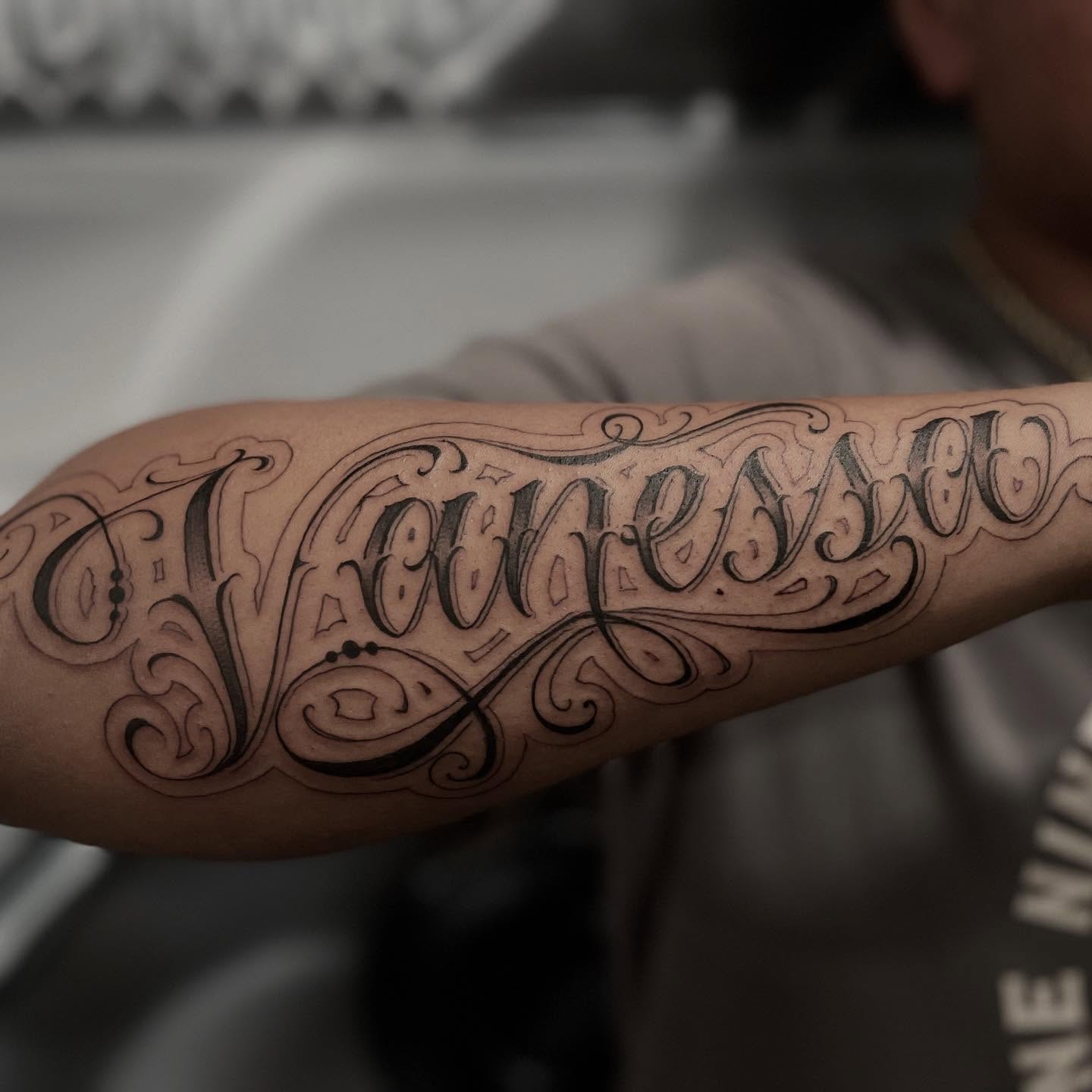 Vanessa lettering script tattoo on the forearm by @nickysix86