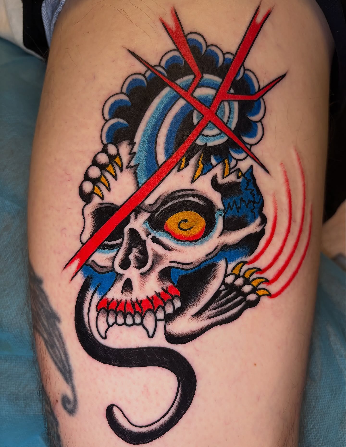 Skull with snake American traditional tattoo on the thigh by Dallas Tattoo Artist