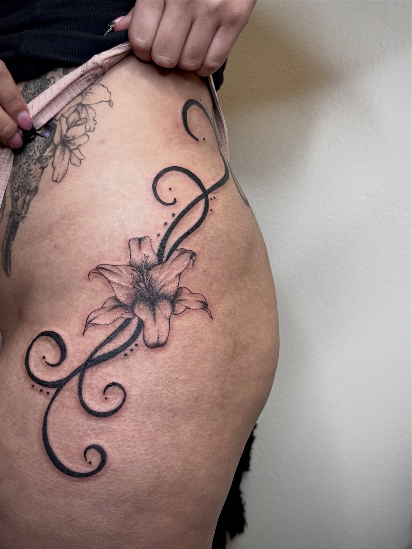 Lily black and grey tattoo on the thigh by Zornitsa ☆