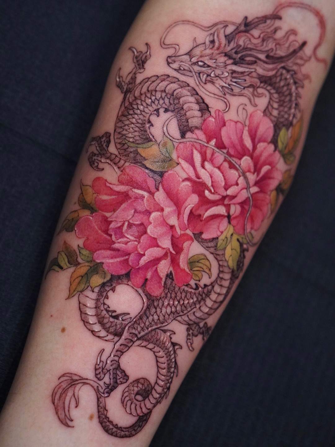 Dragon and peonies japanese irezumi tattoo on the forearm by 🌛 Lê Huỳnh🌜, Dallas, Texas