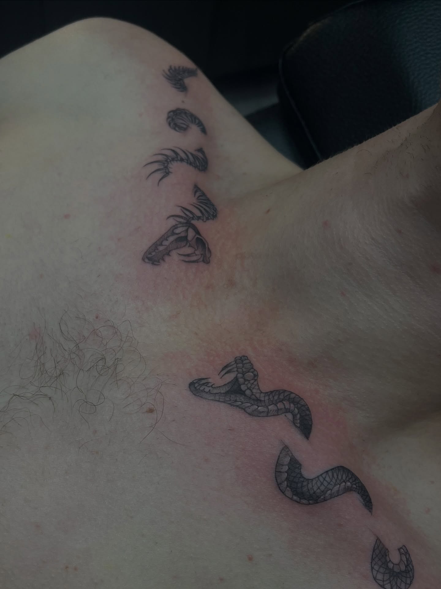 Snakes black and grey tattoo on the neck by ashlyn rene