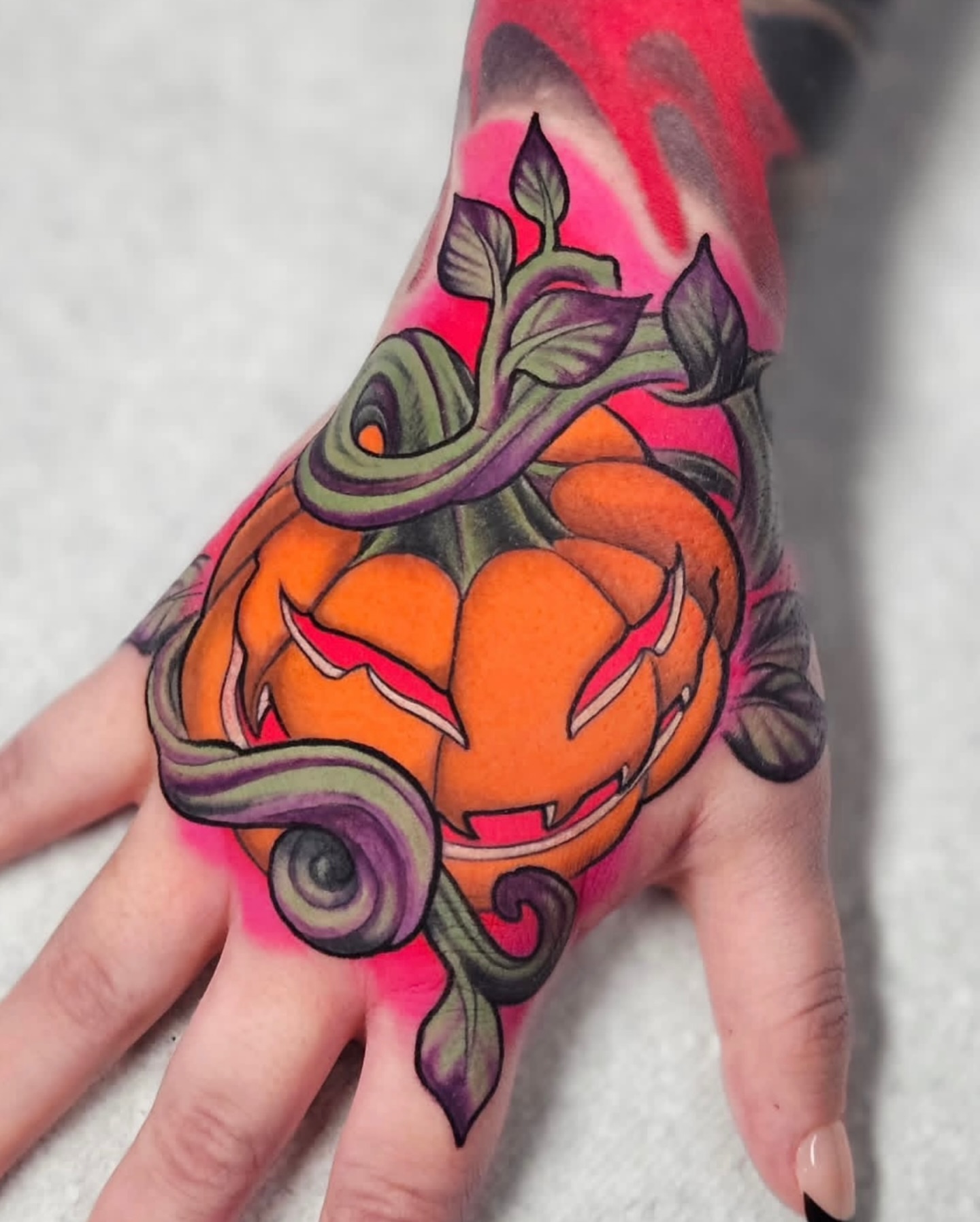 Pumpkin American traditional tattoo on the hand by Bellz Rehder