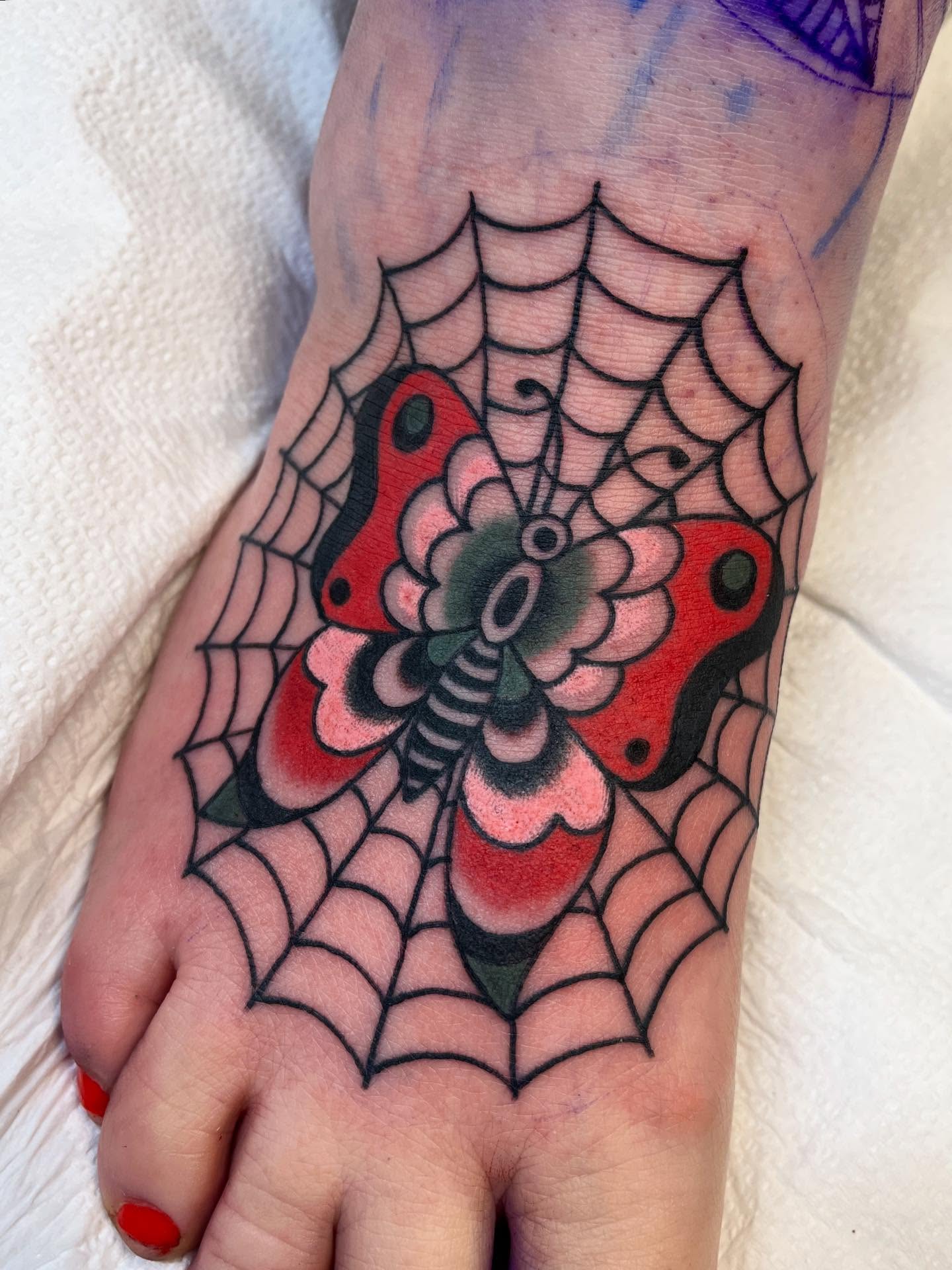 Ladybug and spiderweb American traditional tattoo on the foot by 🌞all Bodies Welcome🌞