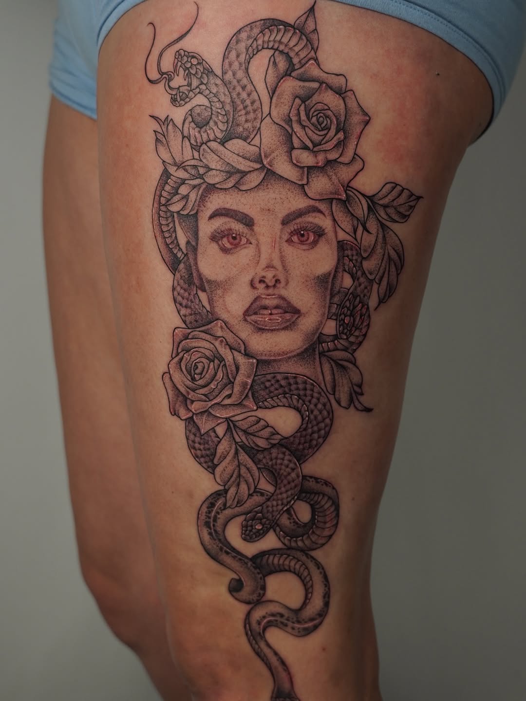 Tattoo by @no_caps_tattoo — dark_realism, black_and_grey