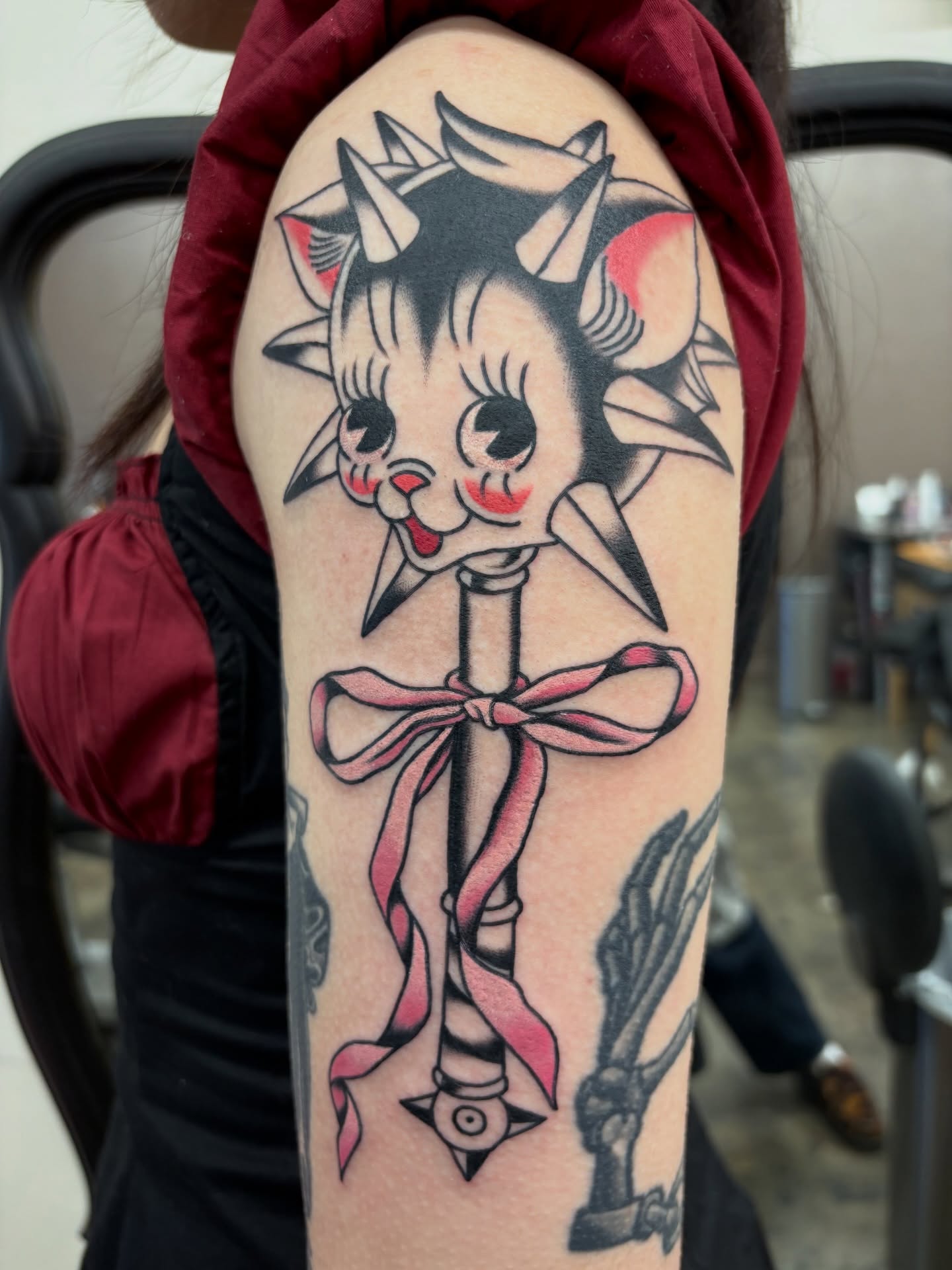 Cat American traditional tattoo on the forearm by Nori