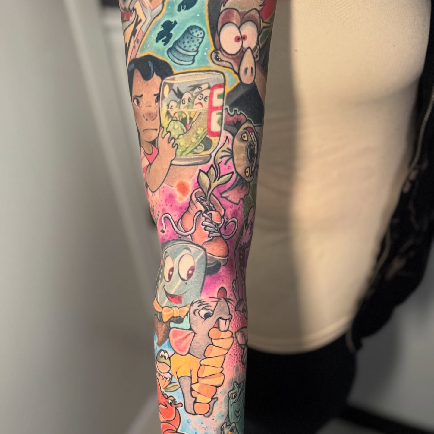 Cartoon characters new school tattoo on the forearm by Steve Gentile Tattoos