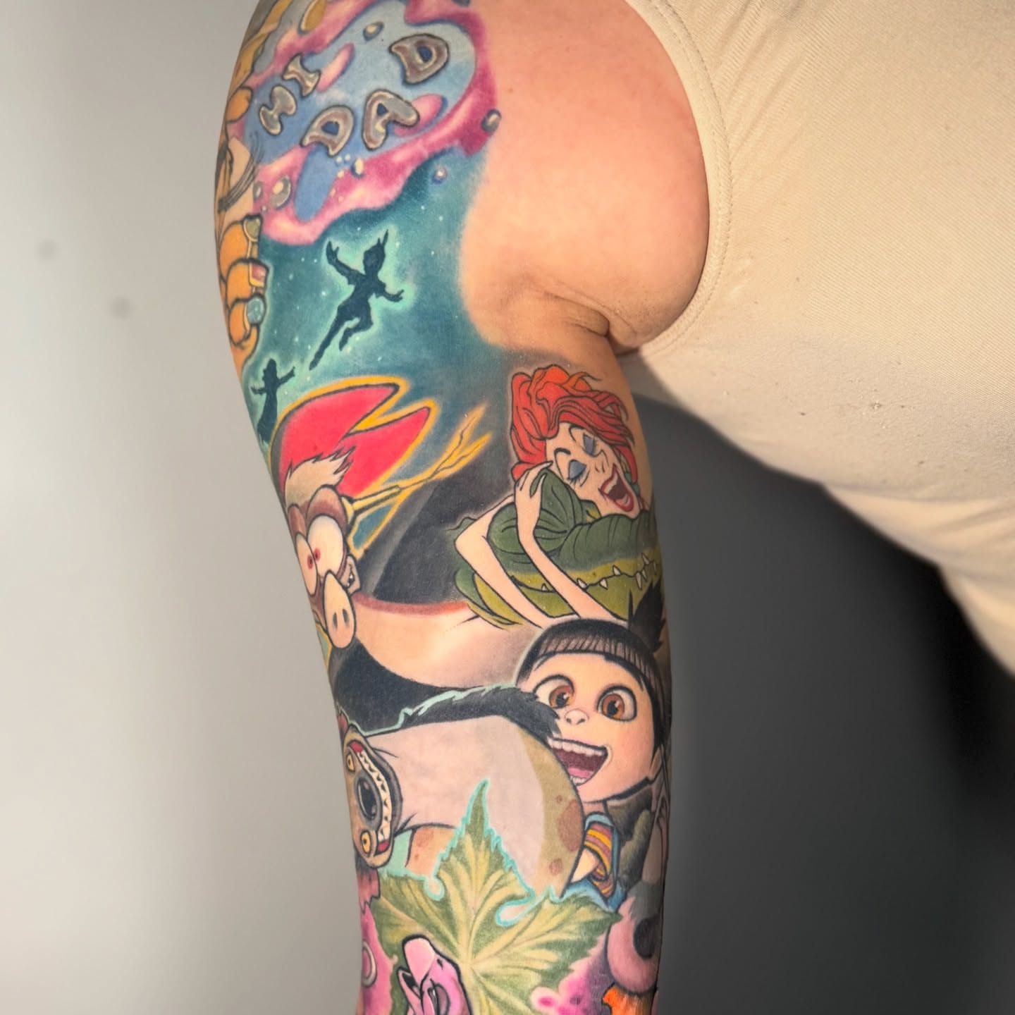 Peter Pan and friends new school tattoo on the forearm by Steve Gentile Tattoos
