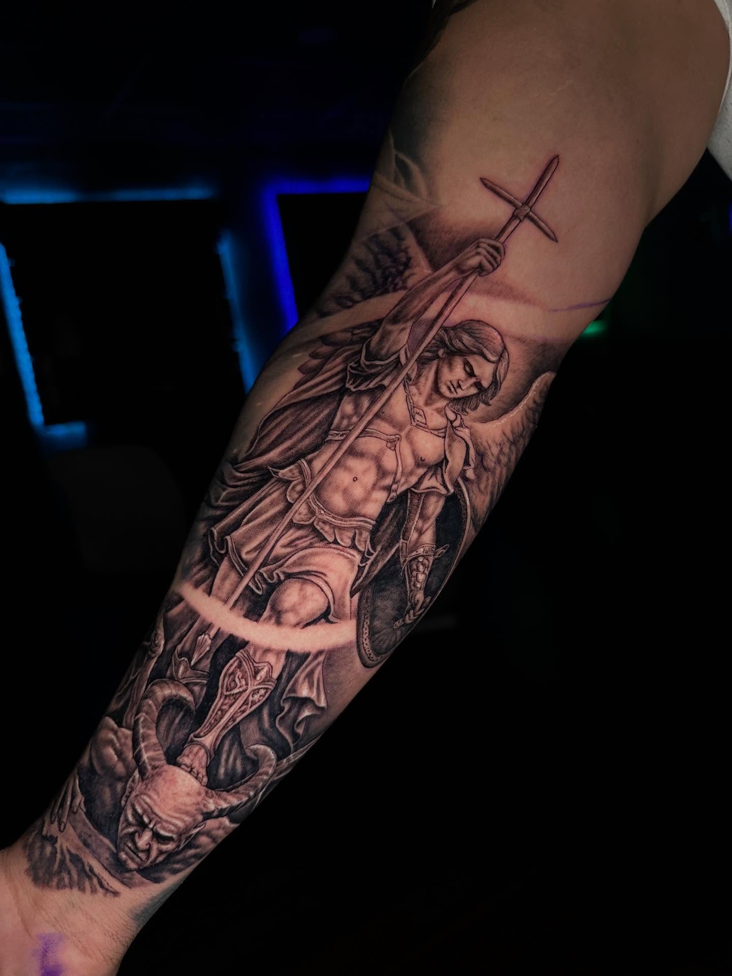 Angel with sword realism tattoo on the forearm by Mario Flores Tattoo