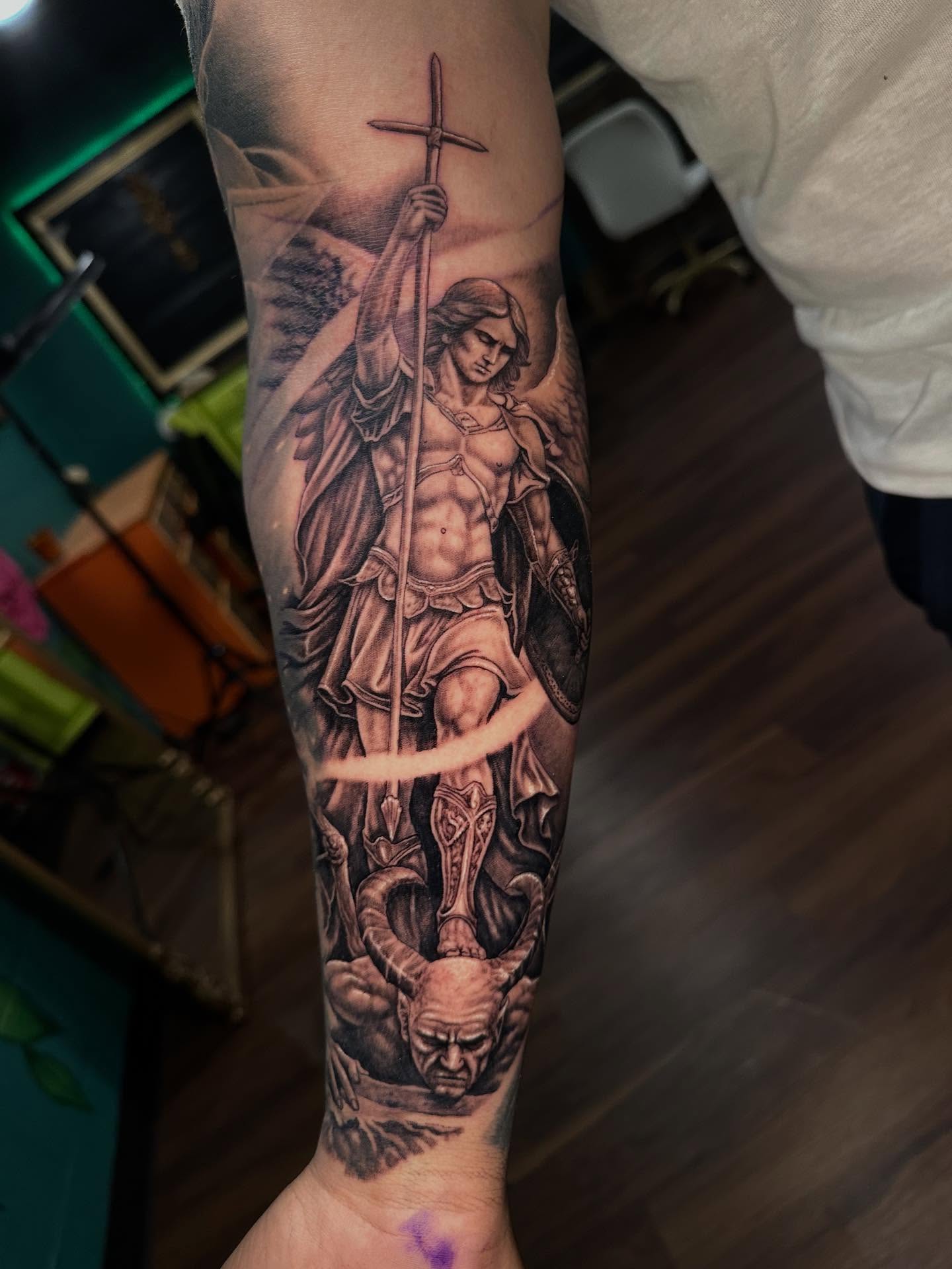 St. michael the archangel realism tattoo on the forearm by Mario Flores Tattoo