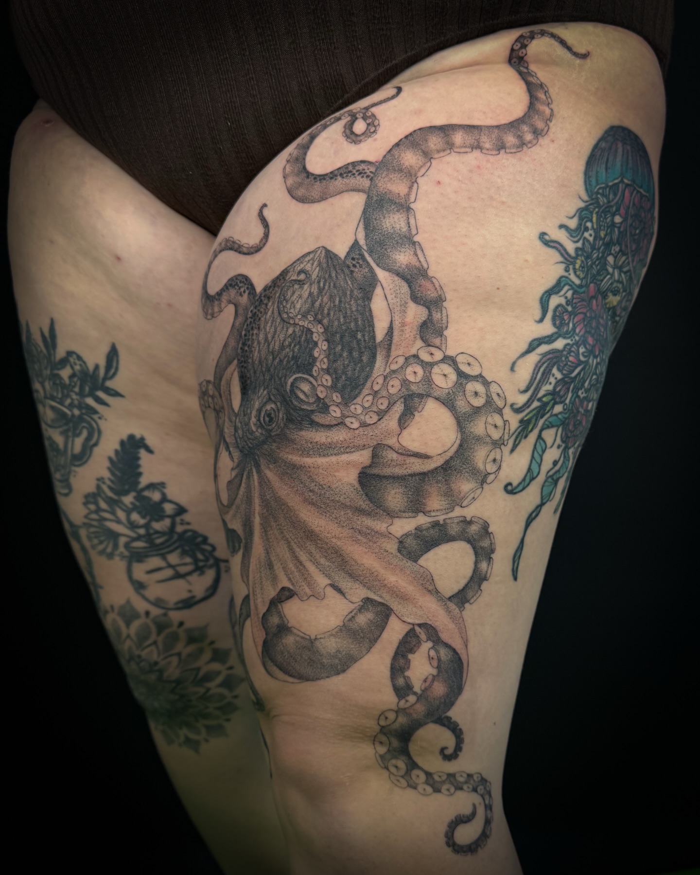 Octopus realism tattoo on the thigh by Kevin Rotramel, Dayton, Ohio