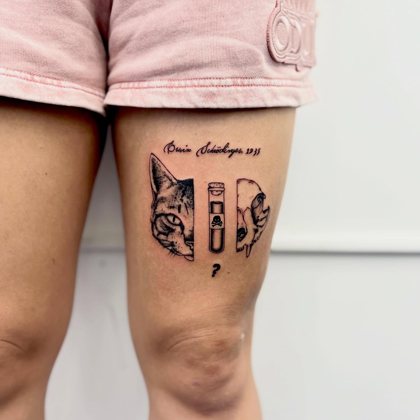 Cat and test tube black and grey tattoo on the thigh by Lip™