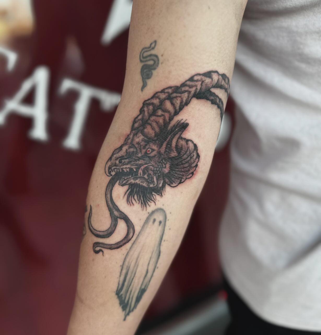 Tattoo by @wizardspire — black_and_grey, realism