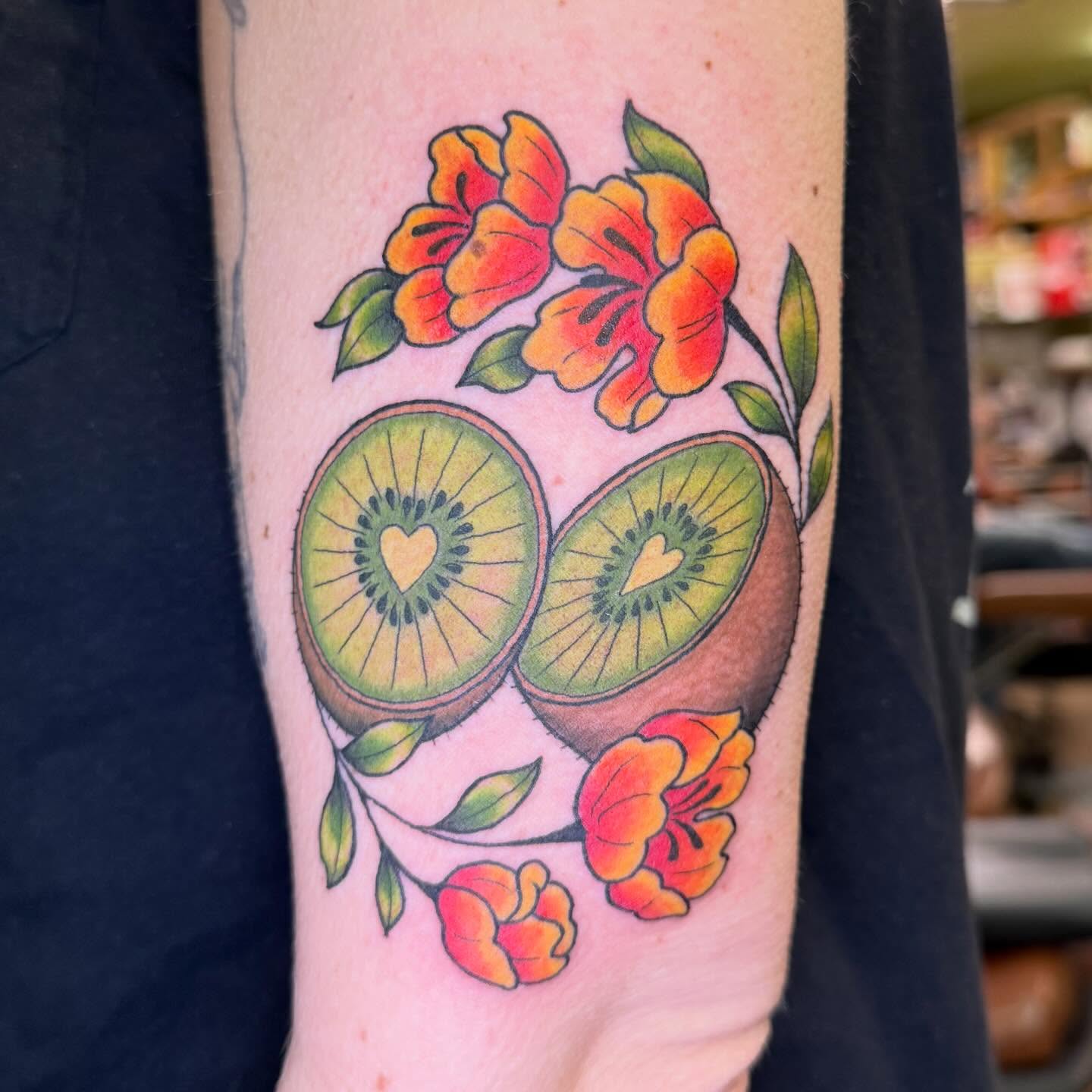 Kiwi slices and flowers dotwork tattoo on the forearm by Liz Glitz - Philadelphia Tattoo Artist