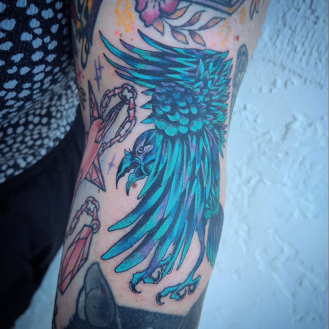 Raven American traditional tattoo on the forearm by Julie MacDonald