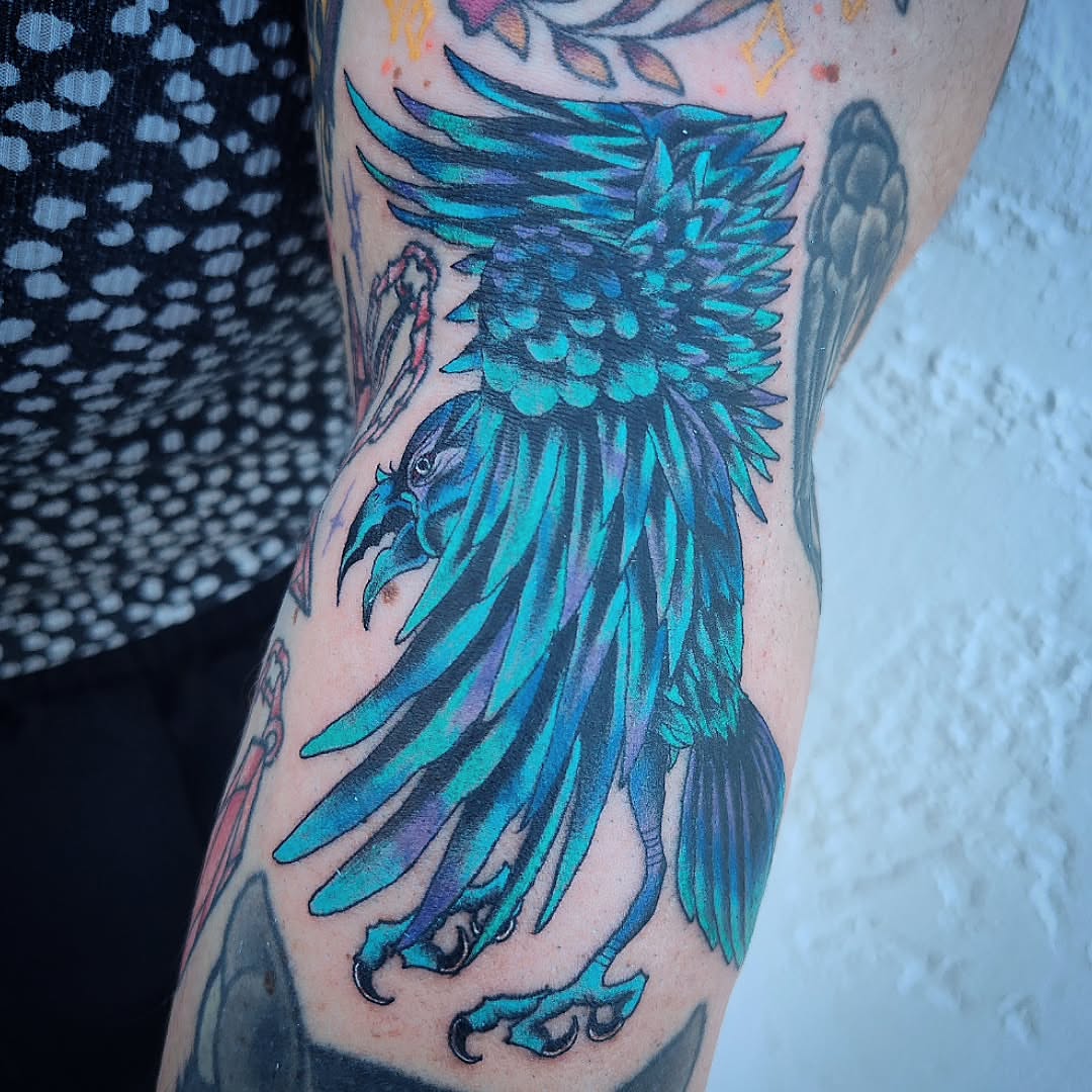 Phoenix American traditional tattoo on the forearm by Julie MacDonald