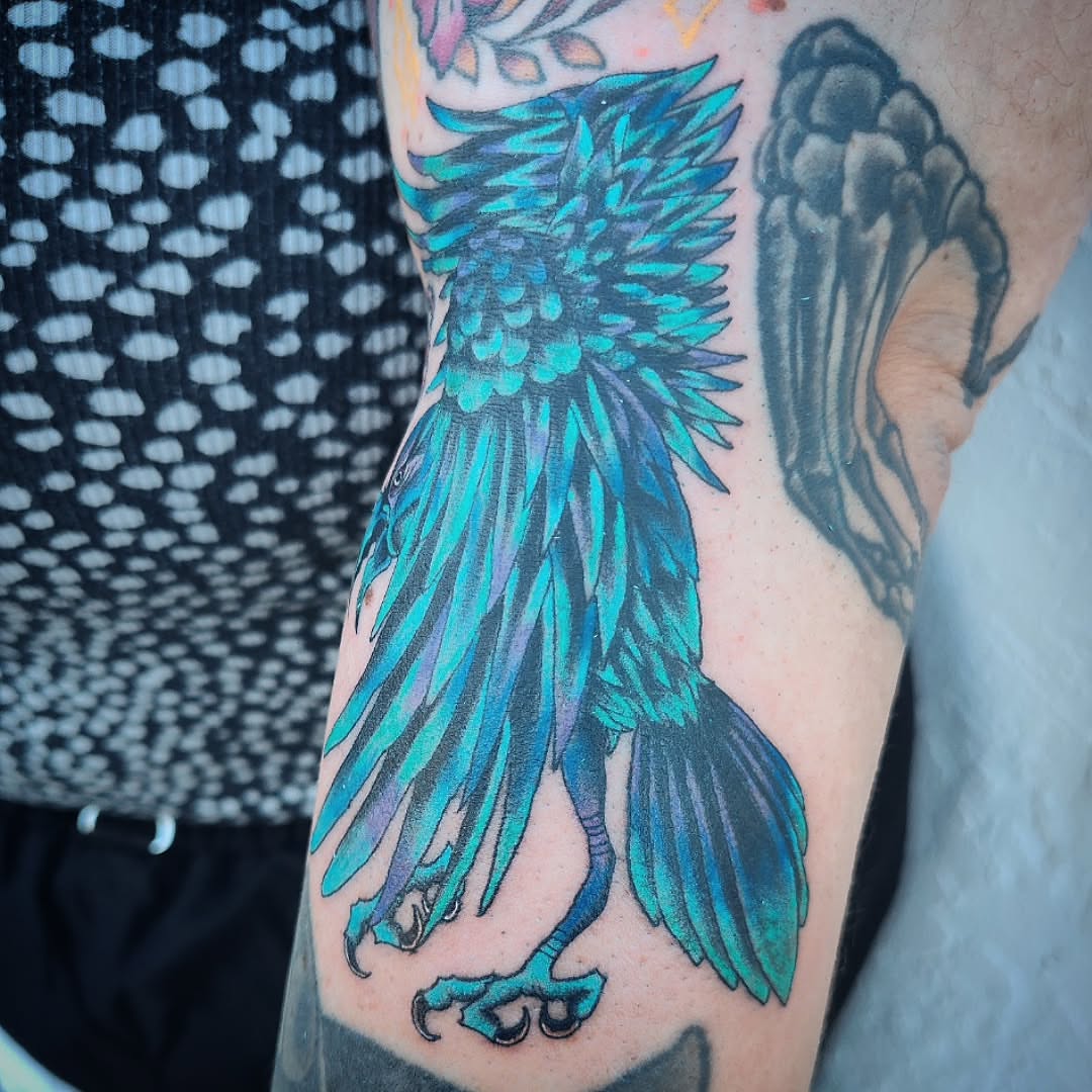 Phoenix neo-traditional tattoo on the forearm by Julie MacDonald