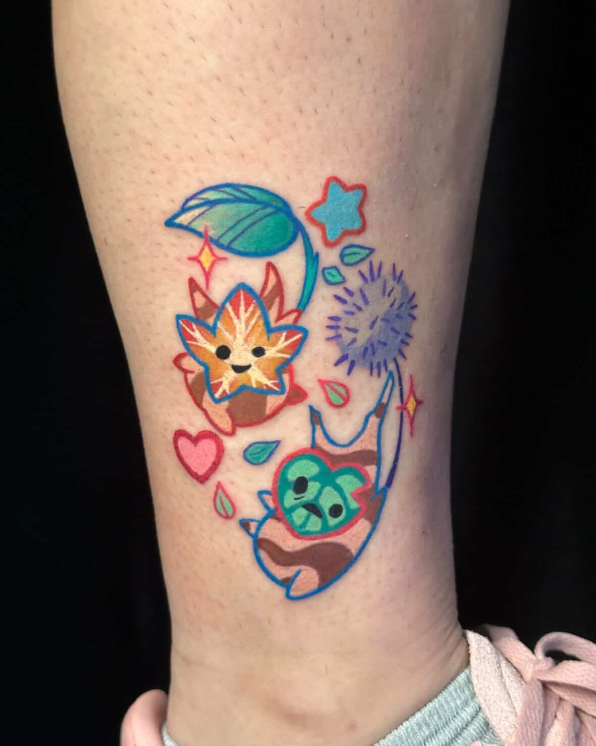 Kawaii-style nature elements illustrative tattoo on the forearm by Dustin Hughes