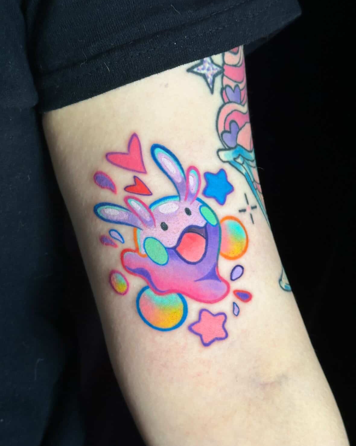 Abstract creature new school tattoo on the forearm by Dustin Hughes