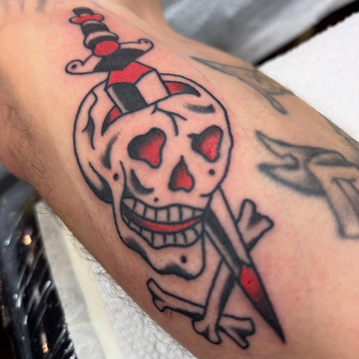 Skull and dagger American traditional tattoo on the forearm by dayton skuse, Portland, Oregon