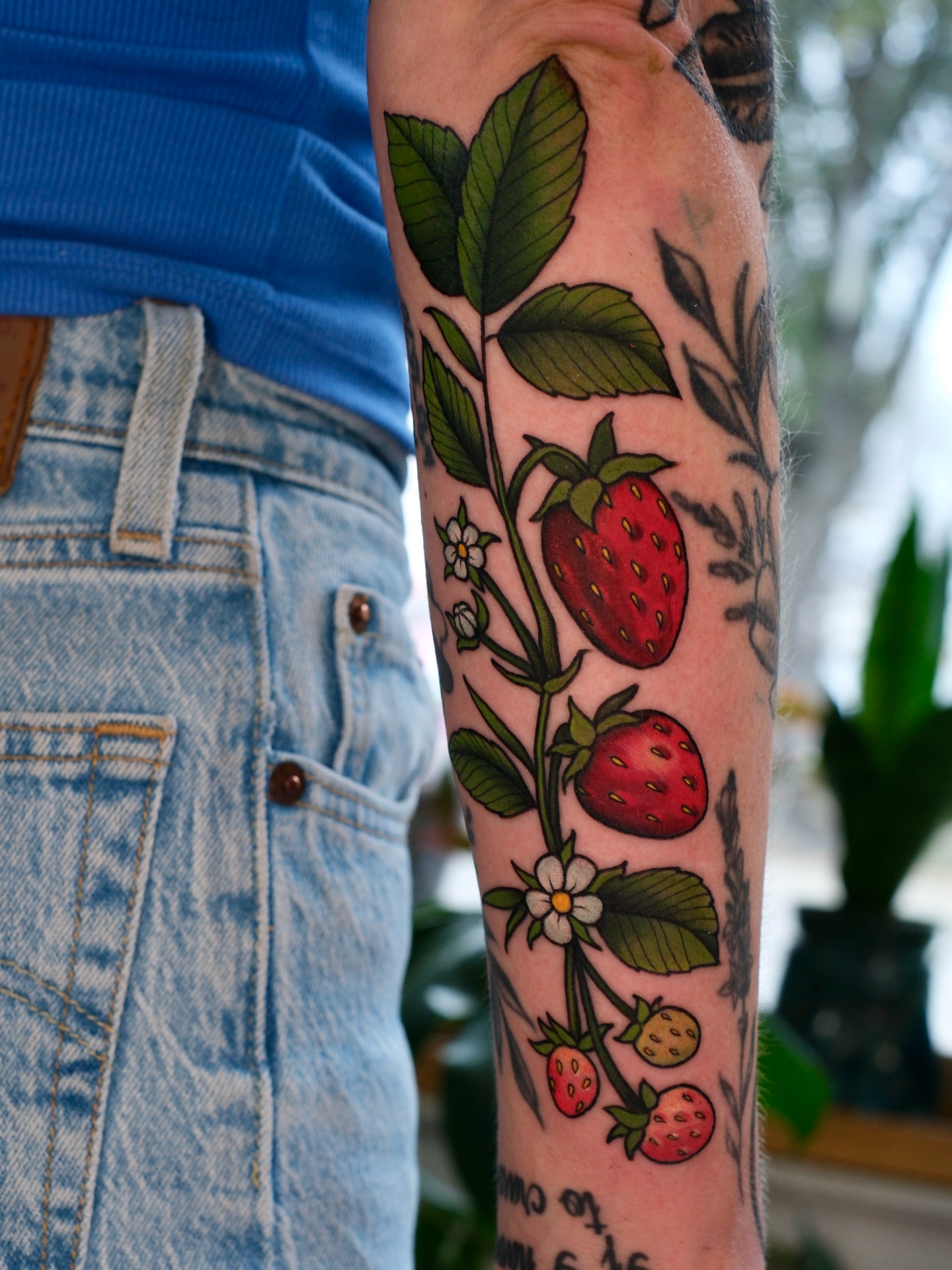 Strawberry plant American traditional tattoo on the forearm by Mallory Murphy, Denton, Texas