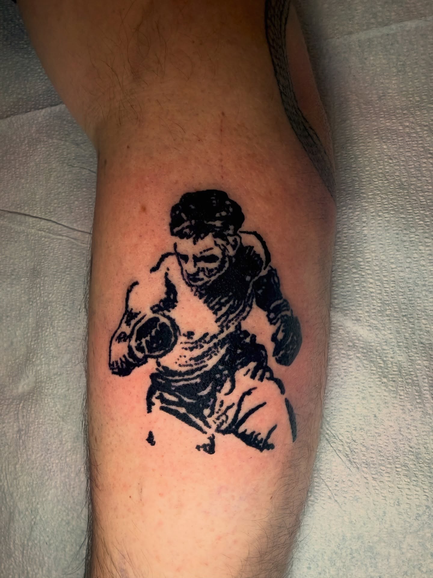 Boxing scene black and grey tattoo on the forearm by Noah Vincent Tattoo, Vancouver, Washington