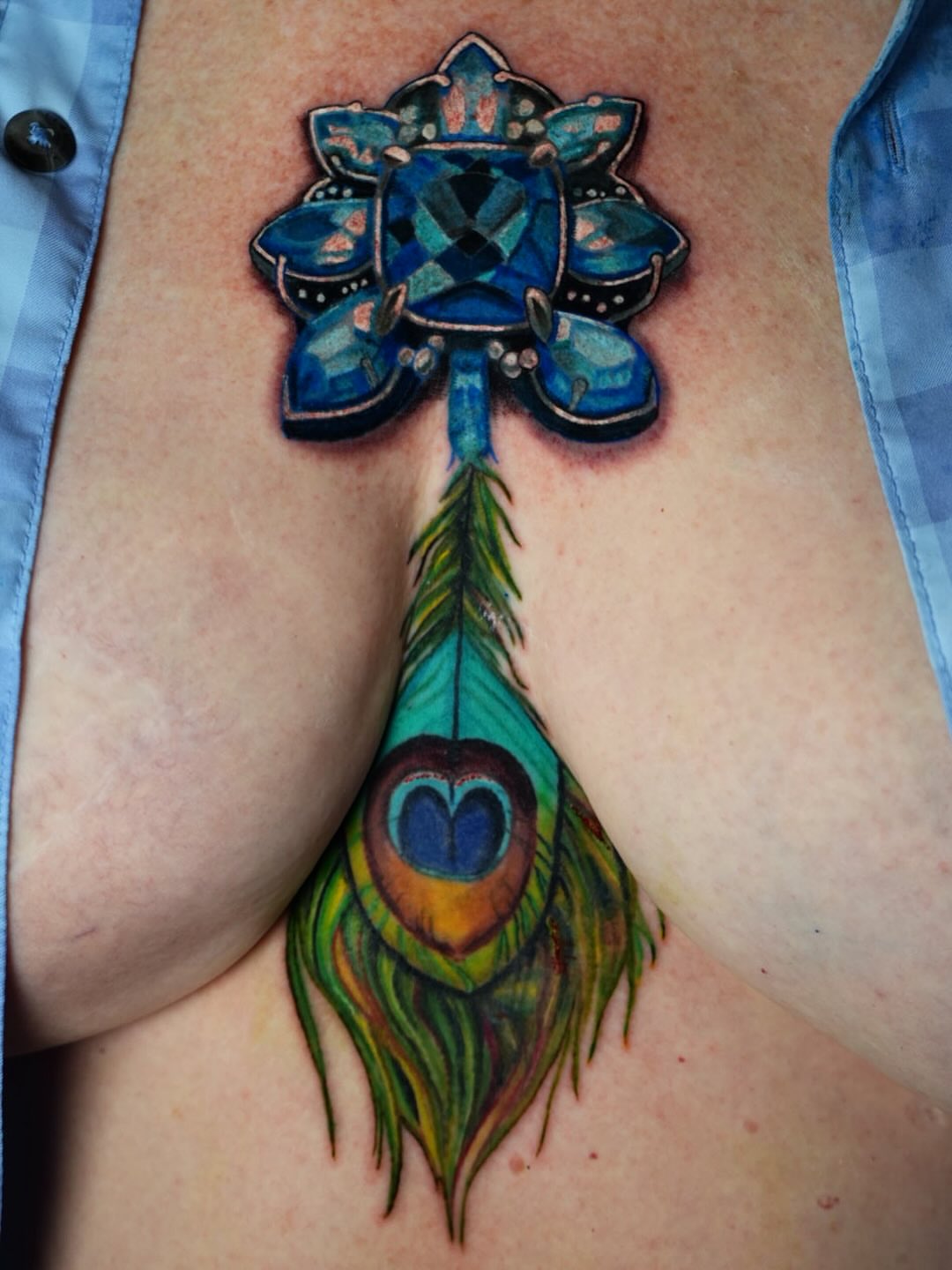 Tattoo by @rayvin_tattoos — watercolor, geometric