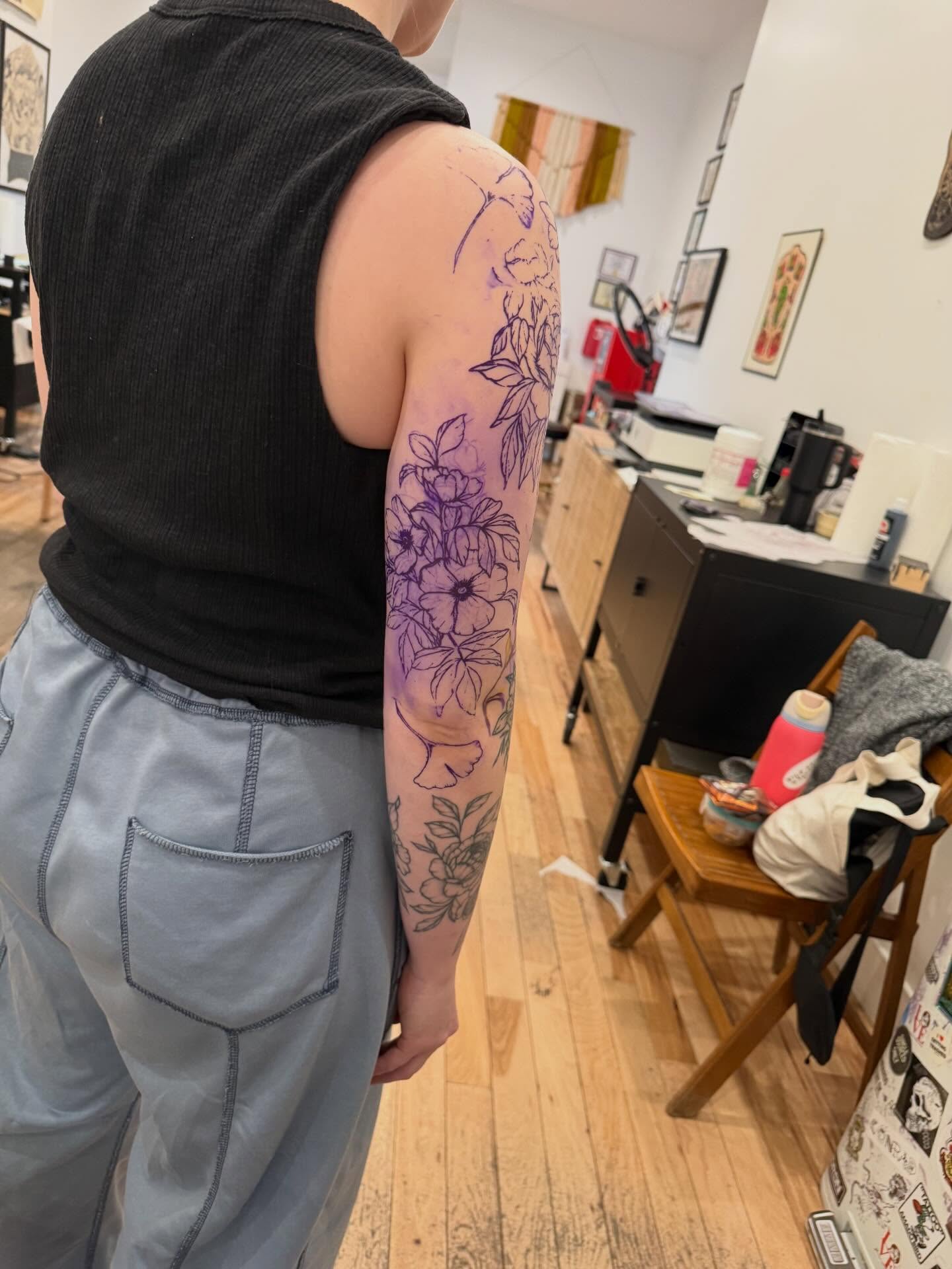 Floral design new school tattoo on the upper arm by Daniel Anthony, Philadelphia, Pennsylvania