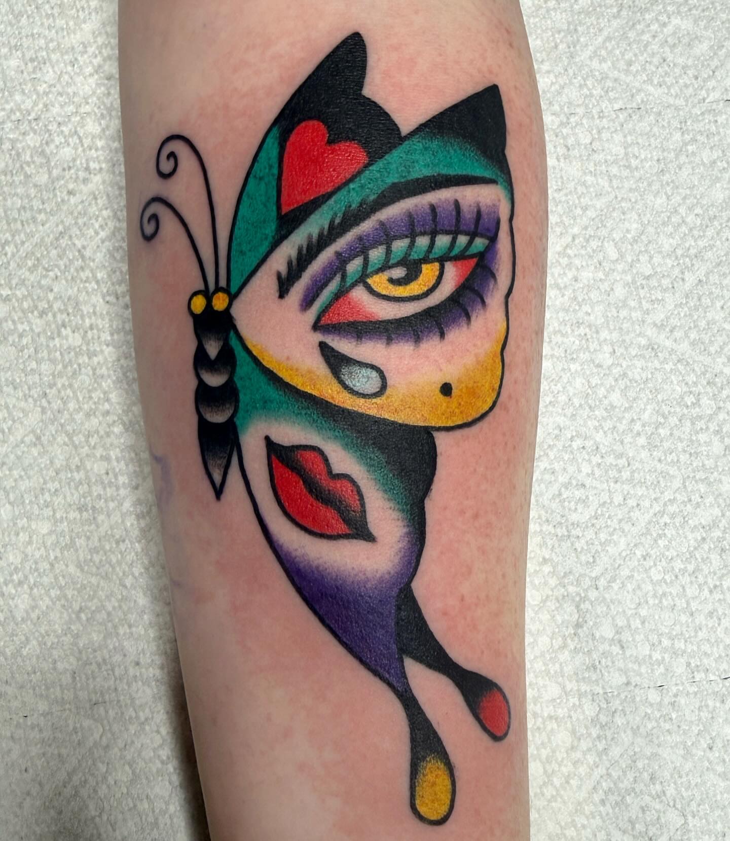 Butterfly American traditional tattoo on the forearm by ༺tessa༻