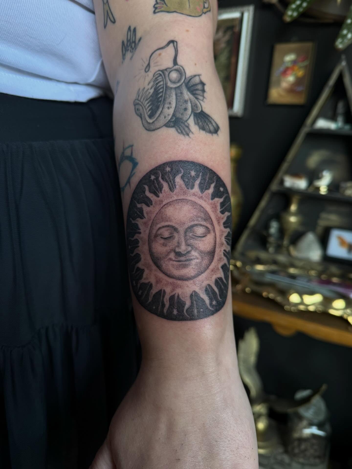 Sun with face realism tattoo on the forearm by Cort Prescott 🕸 OKC Tattoo Artist, Oklahoma City, Oklahoma