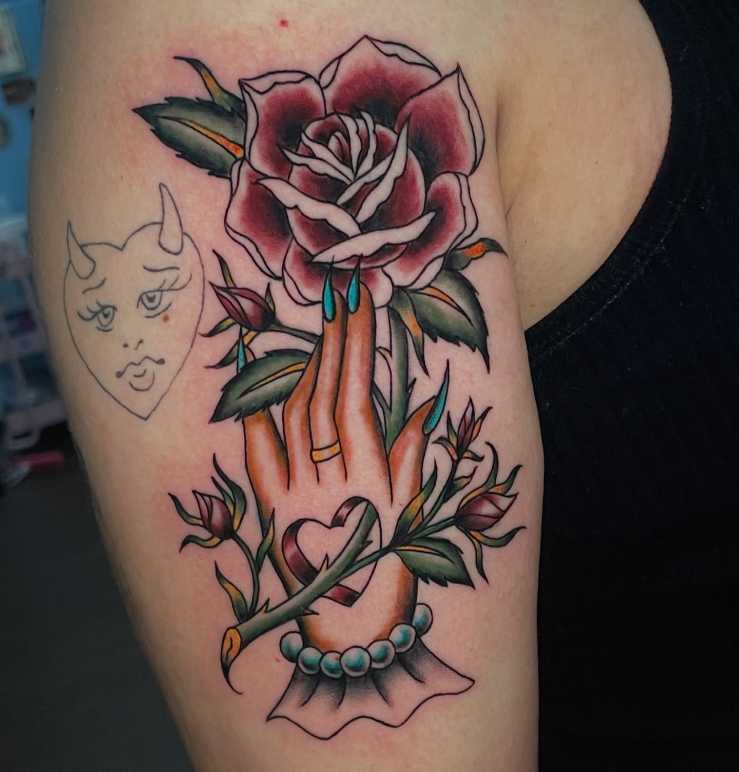 Rose and hand American traditional tattoo on the thigh by Marie π Tattoos