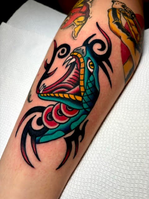 Snake American traditional tattoo on the forearm by Mickey Putillo, Charlotte, North Carolina