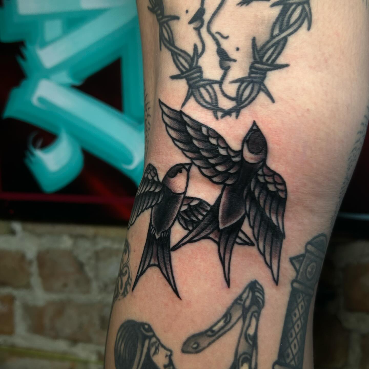 Swallows American traditional tattoo on the forearm by Alycia