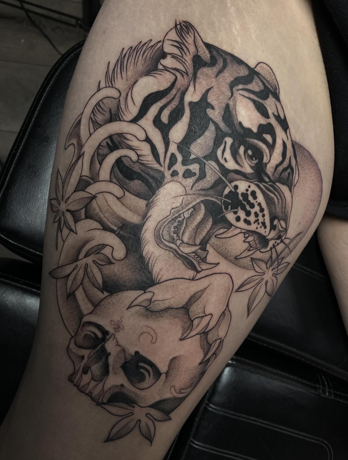 Tiger and skull dotwork tattoo on the thigh by K A R L y K I T S O N