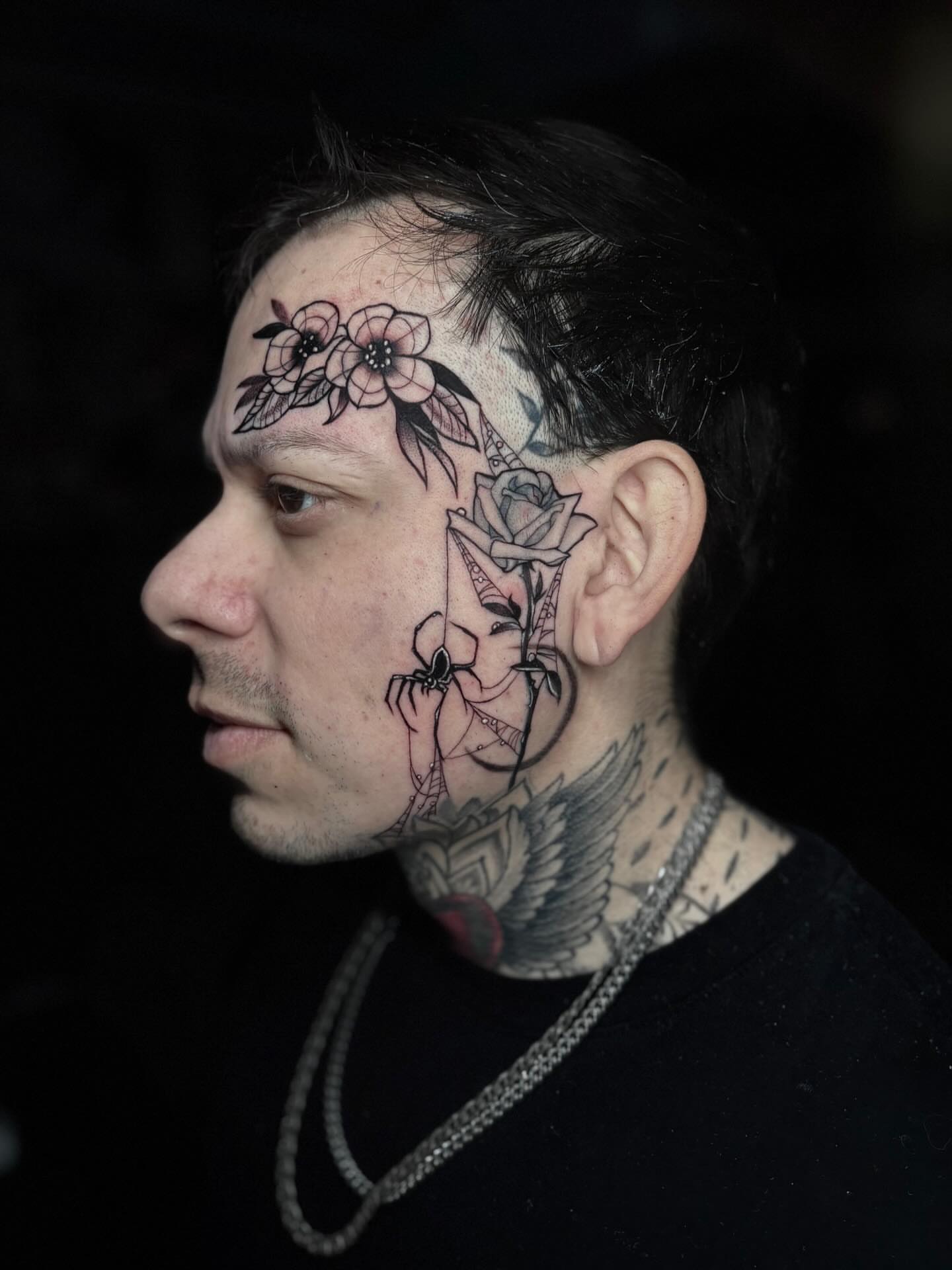 Floral arrangement black and grey tattoo on the head by Mim