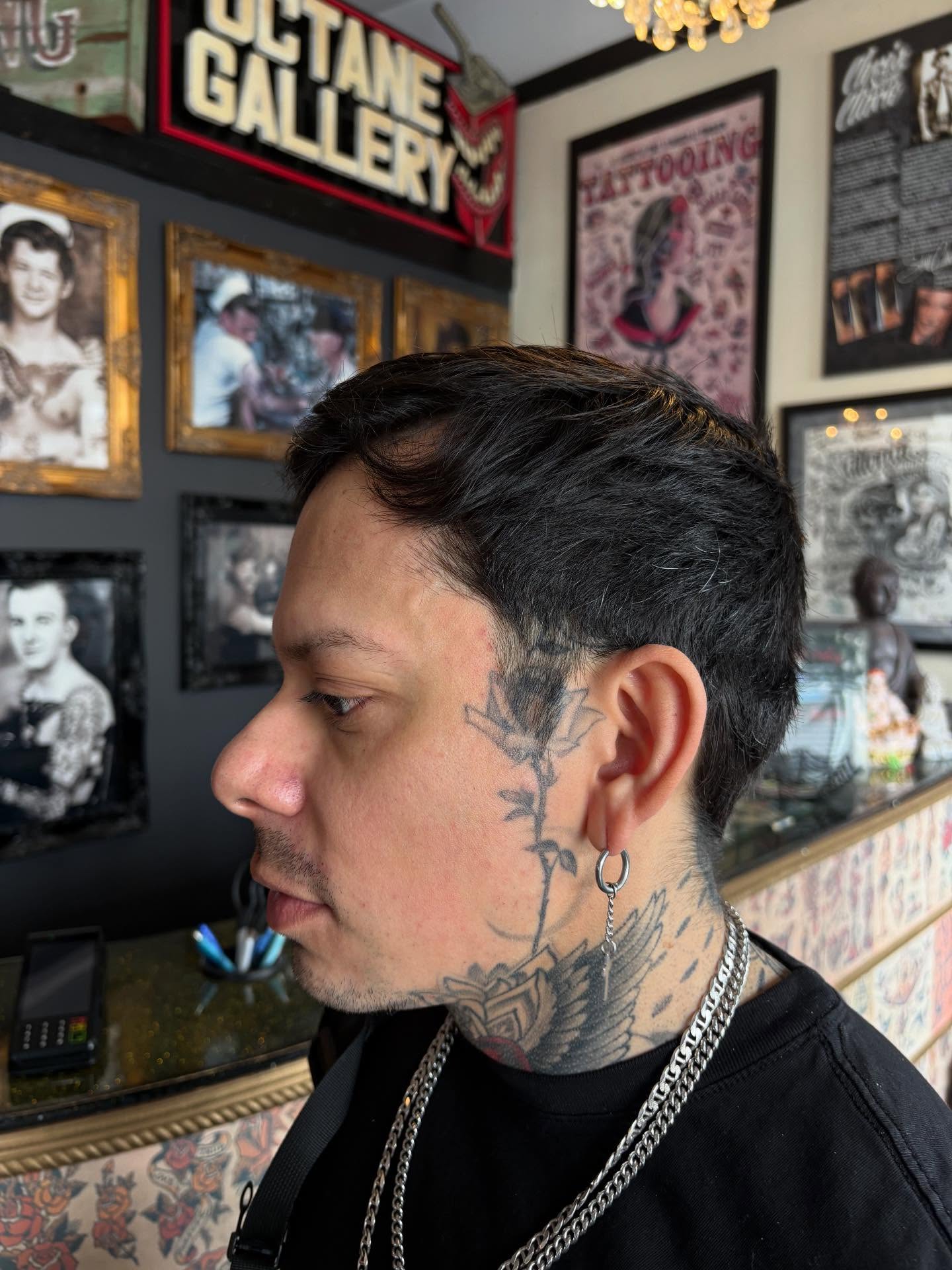 Floral vine American traditional tattoo on the neck by Mim