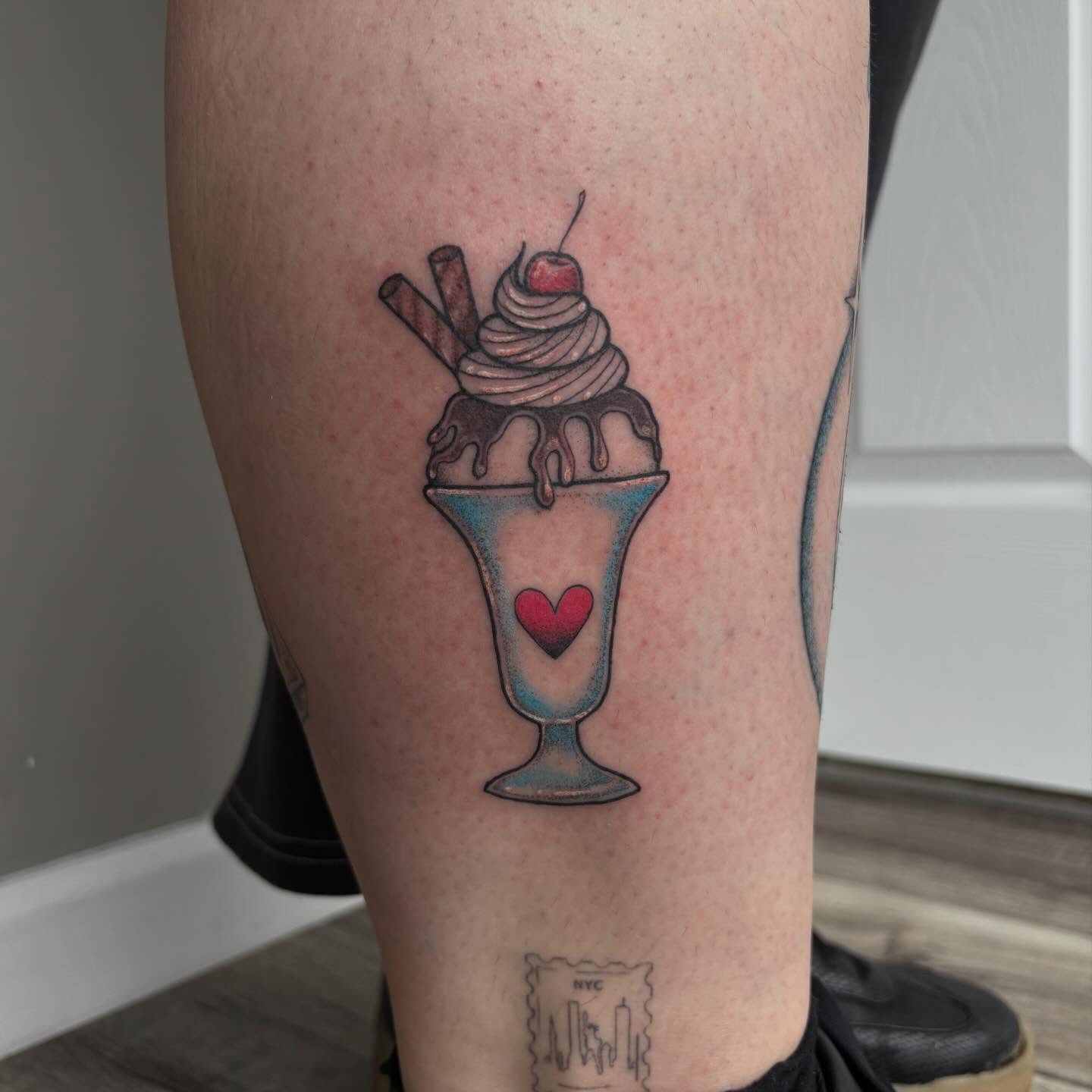 Ice cream sundae realism tattoo on the thigh by Hailey Nicole