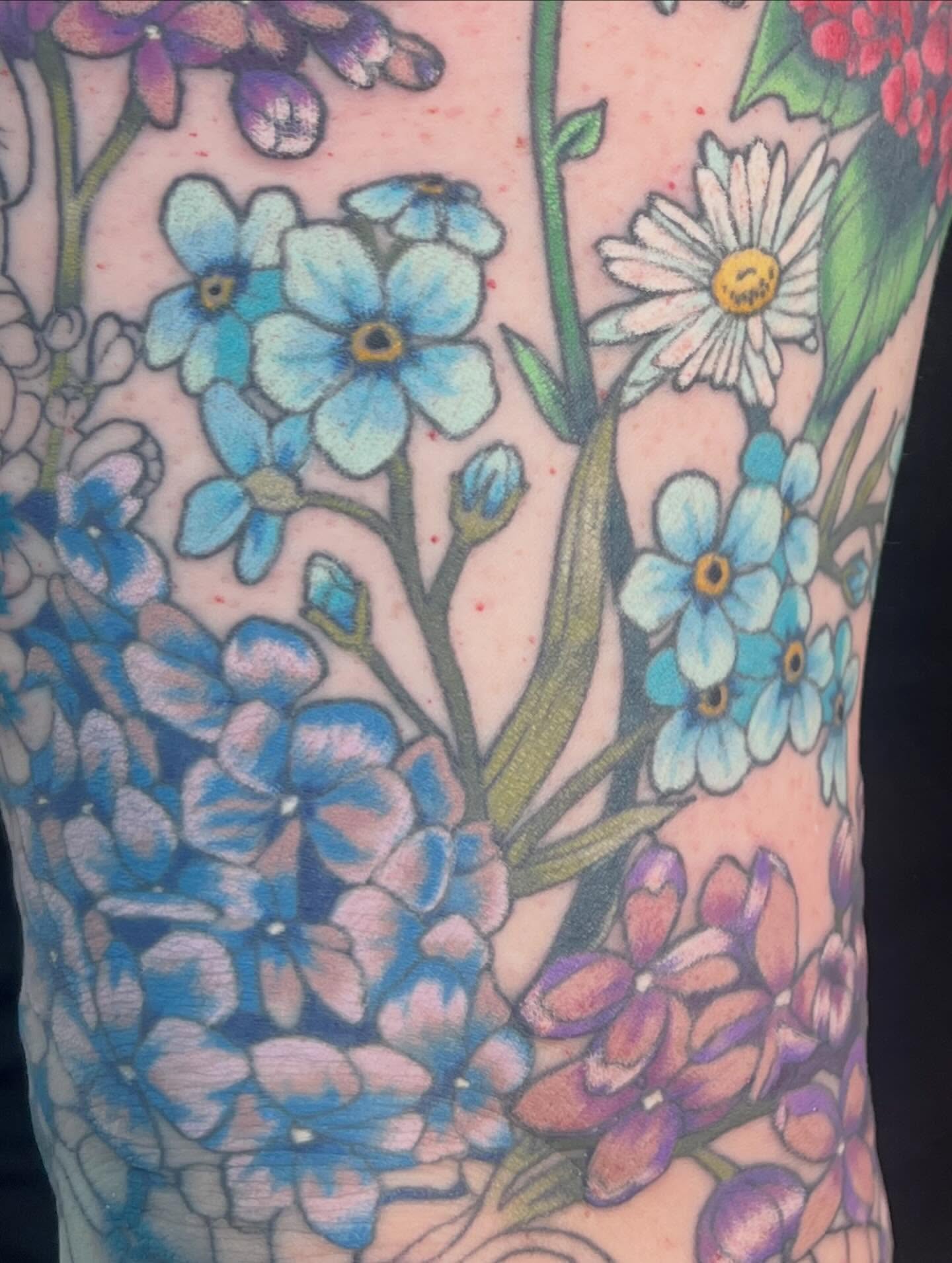 Floral bouquet realism tattoo on the forearm by 🍄‍🟫🍄Moth🍄🍄‍🟫