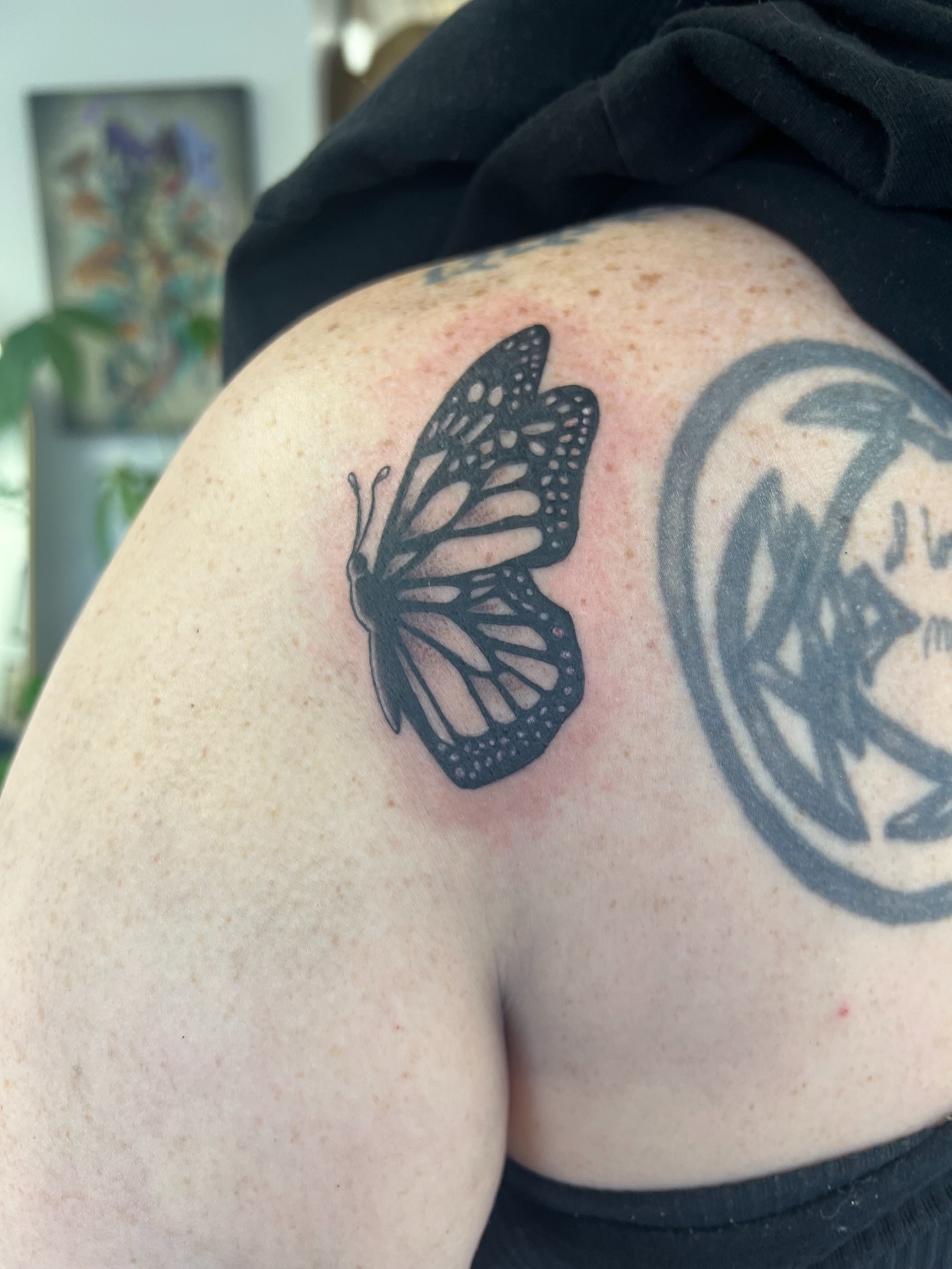 Butterfly black and grey tattoo on the shoulder by Deni Carolina