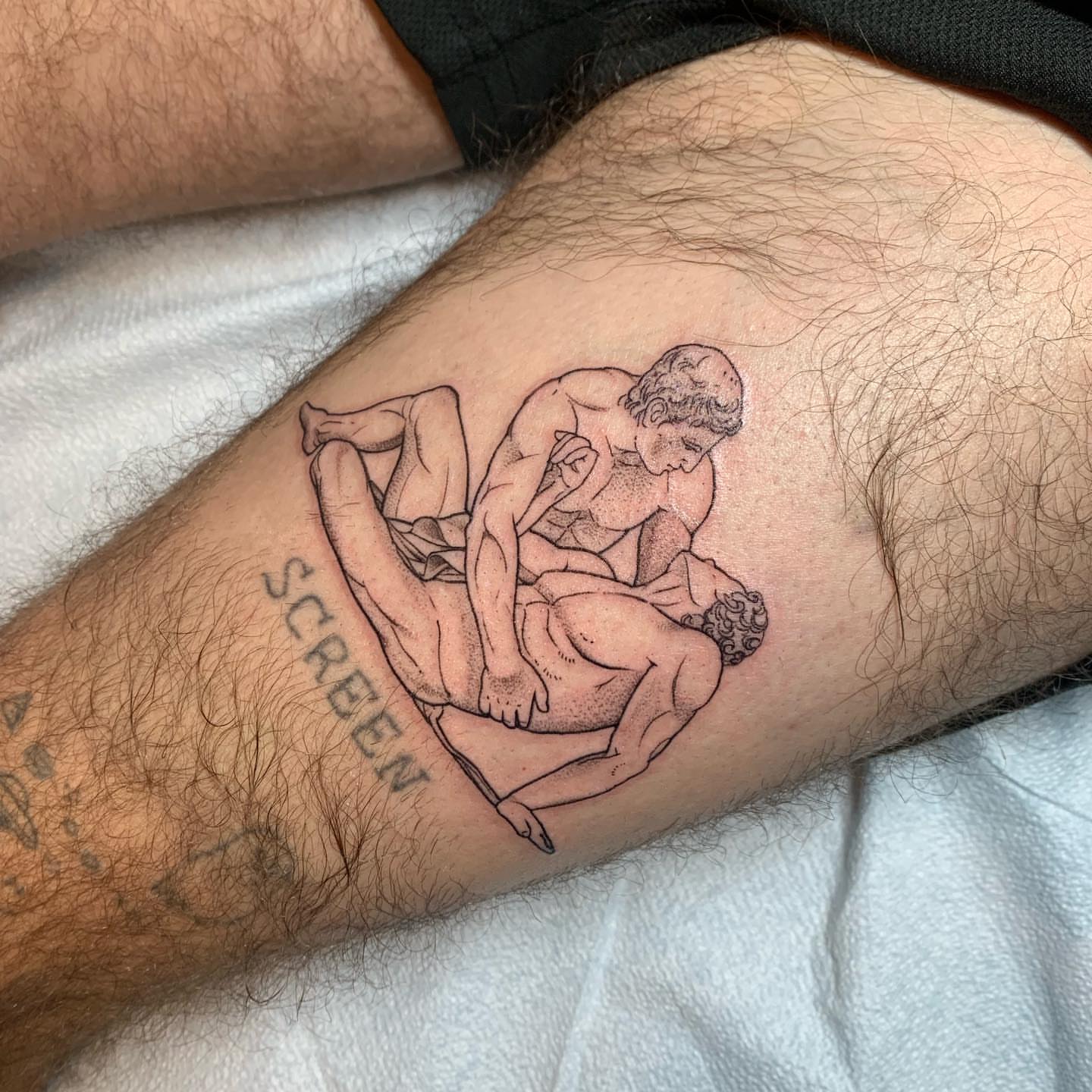 Couple black and grey tattoo on the forearm by Tabby Wirebach, Kutztown, Pennsylvania