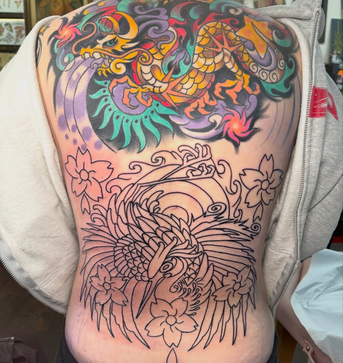 Dragon and phoenix japanese irezumi tattoo on the ribs by sydtatz