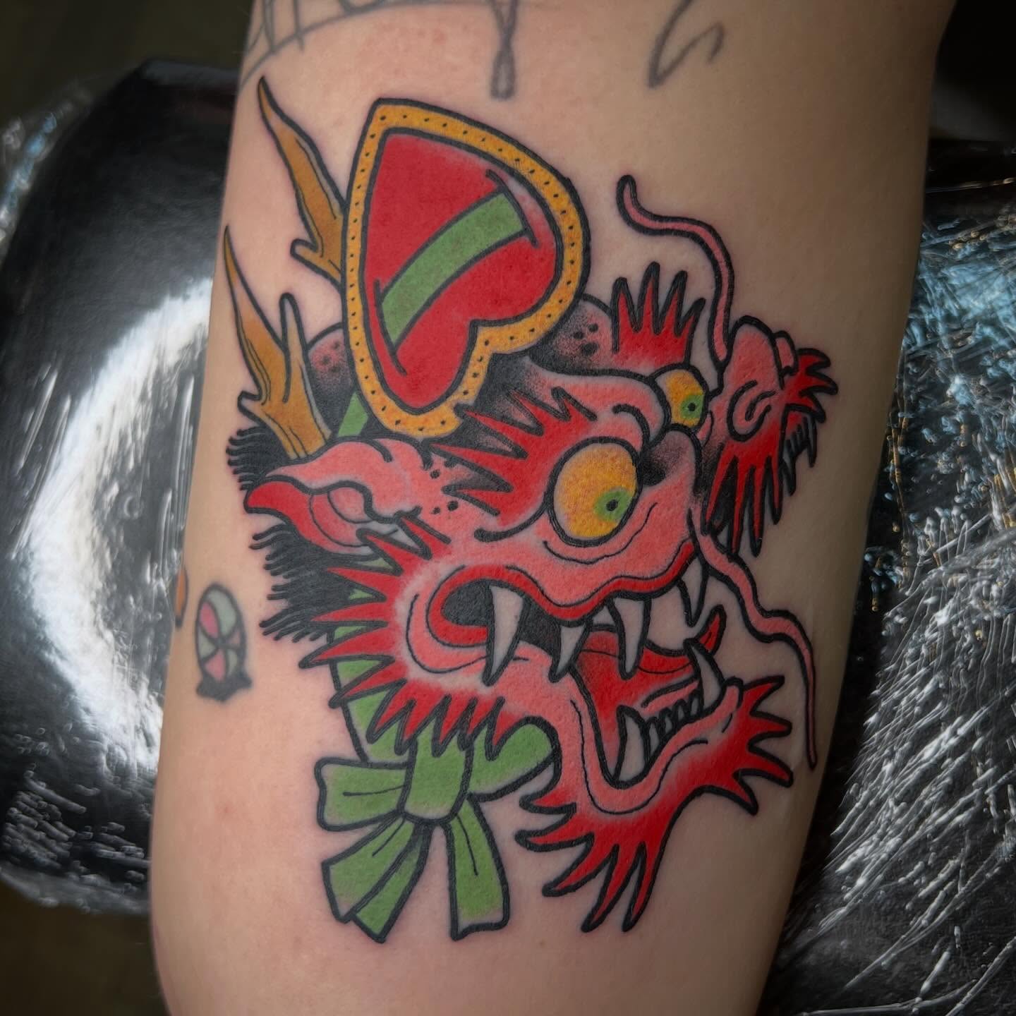 Dragon American traditional tattoo on the forearm by Troy David Souders