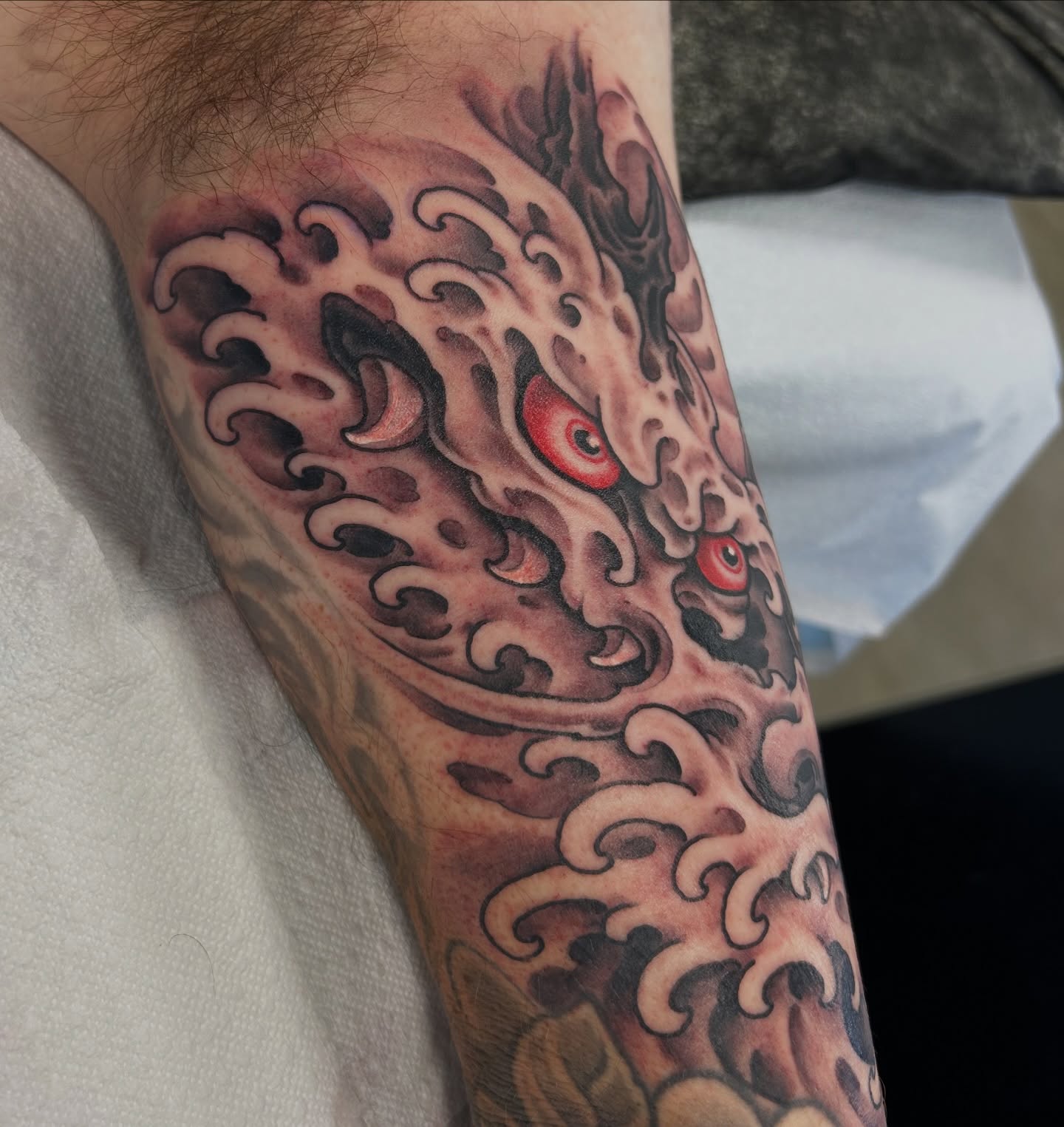 Dragon japanese irezumi tattoo on the forearm by Justin Weatherholtz, New York, New York