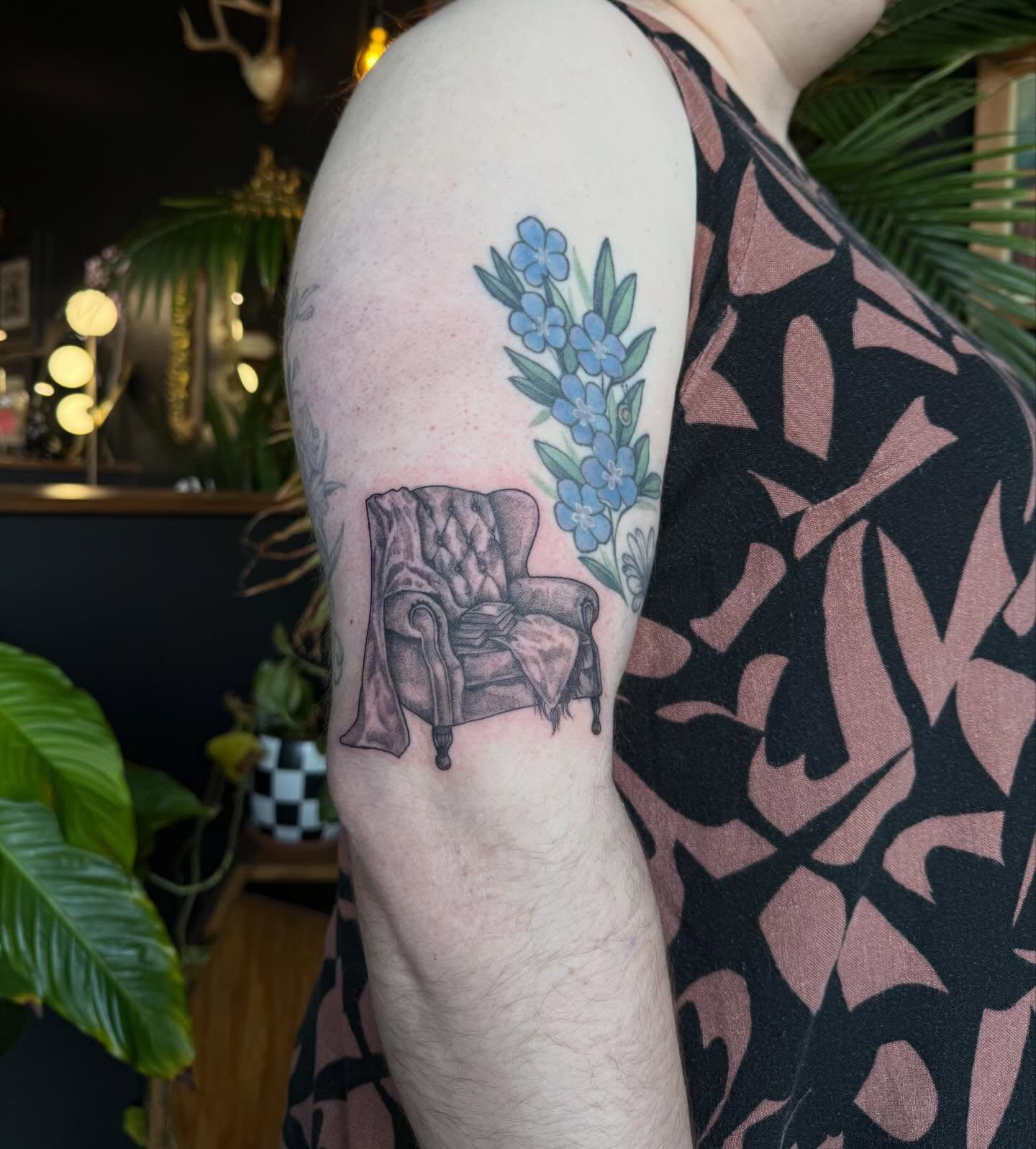 Armchair and flowers realism tattoo on the forearm by Cort Prescott 🕸 OKC Tattoo Artist, Oklahoma City, Oklahoma