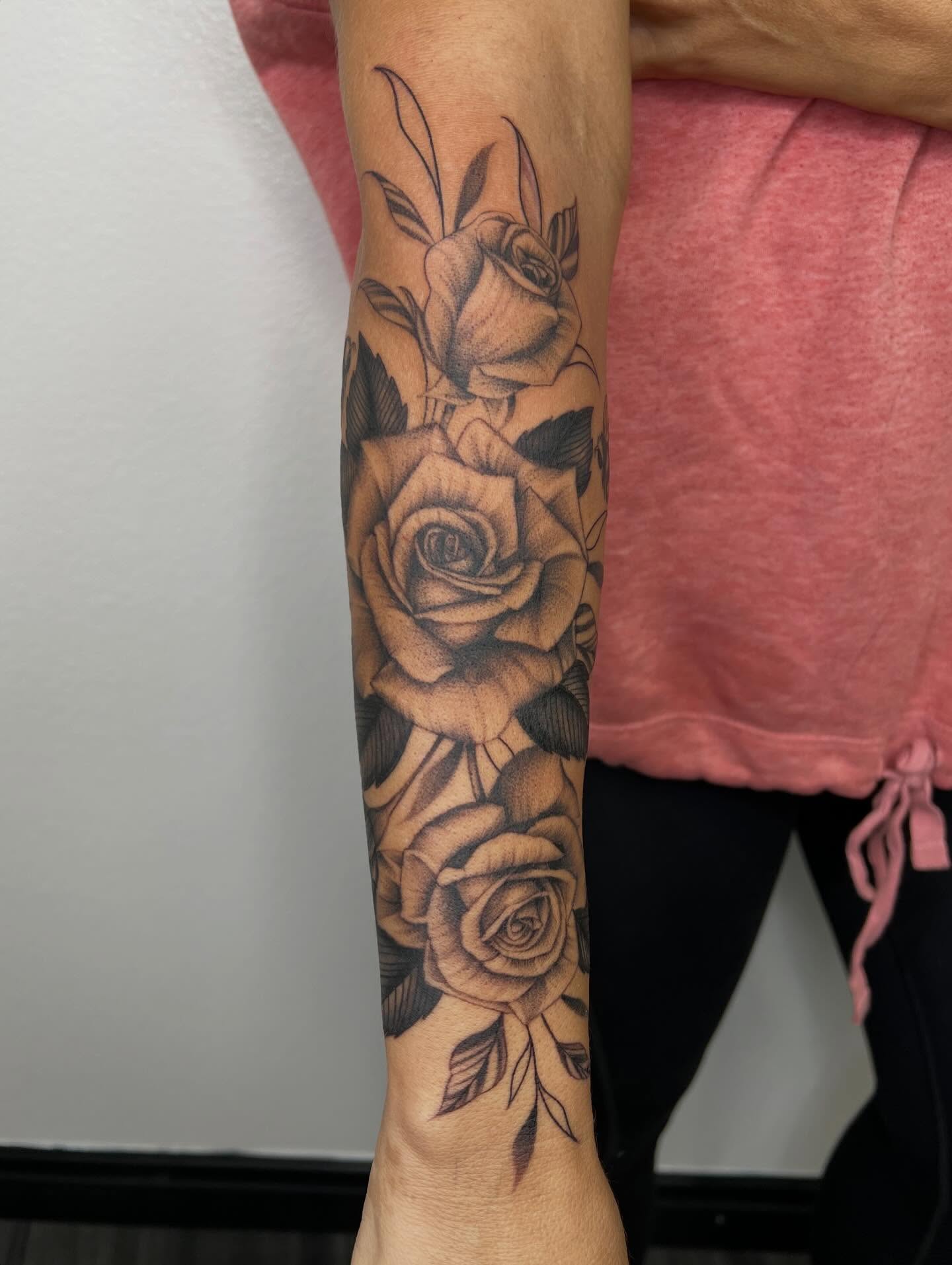 Roses black and grey tattoo on the forearm by San Diego Fineline Black & Grey Tattoo Artist