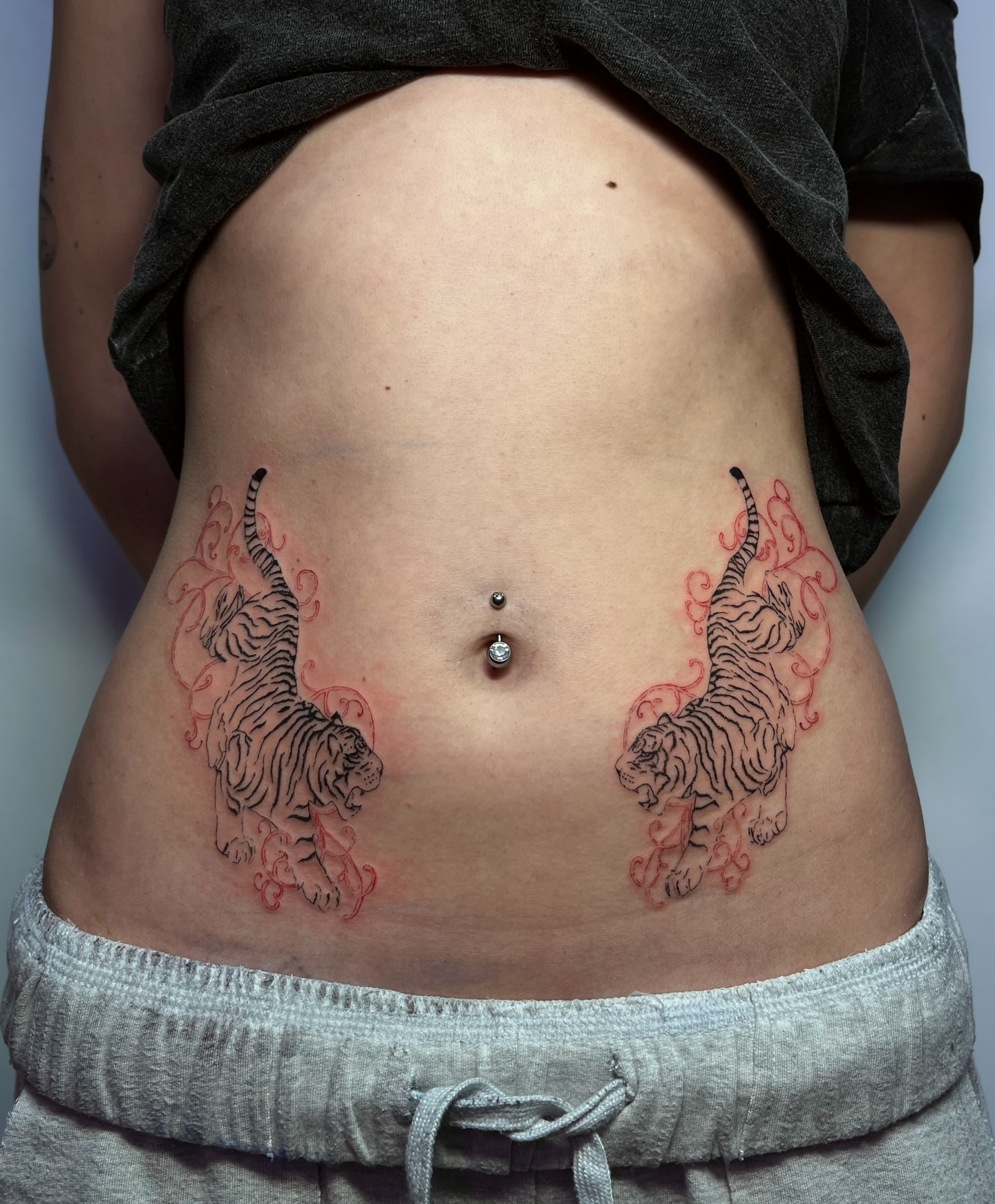 Tigers American traditional tattoo on the torso by MK