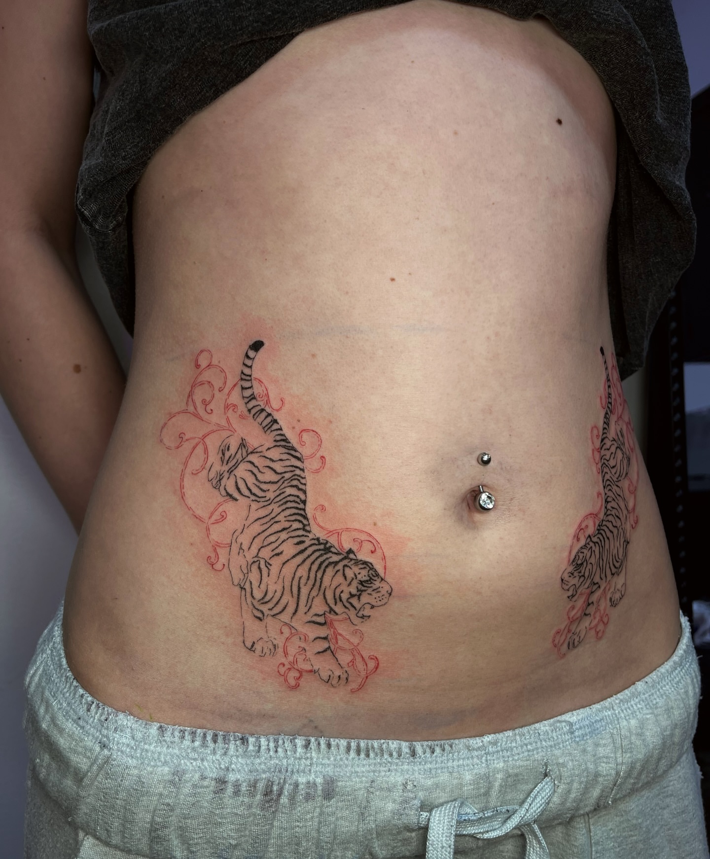 Tiger black and grey tattoo on the torso by MK