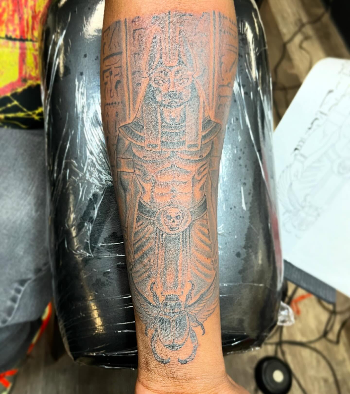 Ancient Egyptian deity black and grey tattoo on the forearm by Hit & Run Tattoo, Dayton, Ohio