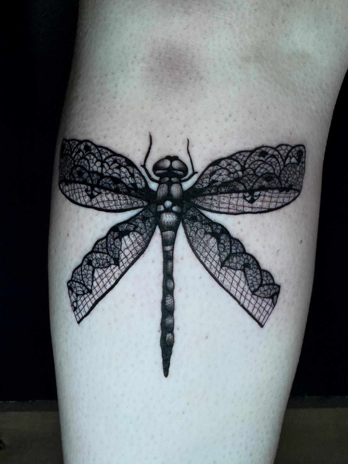 Dragonfly black and grey tattoo on the forearm by Morgan Peeples