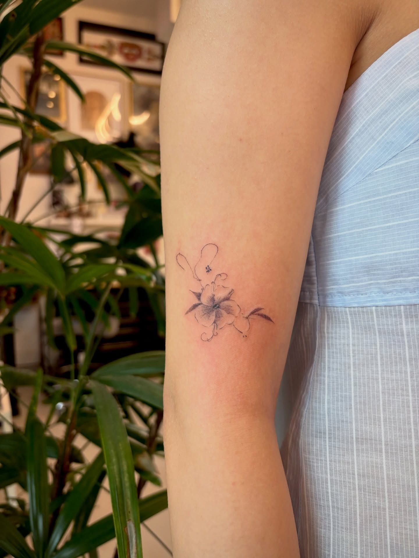 Flower black and grey tattoo on the forearm by @tattotos